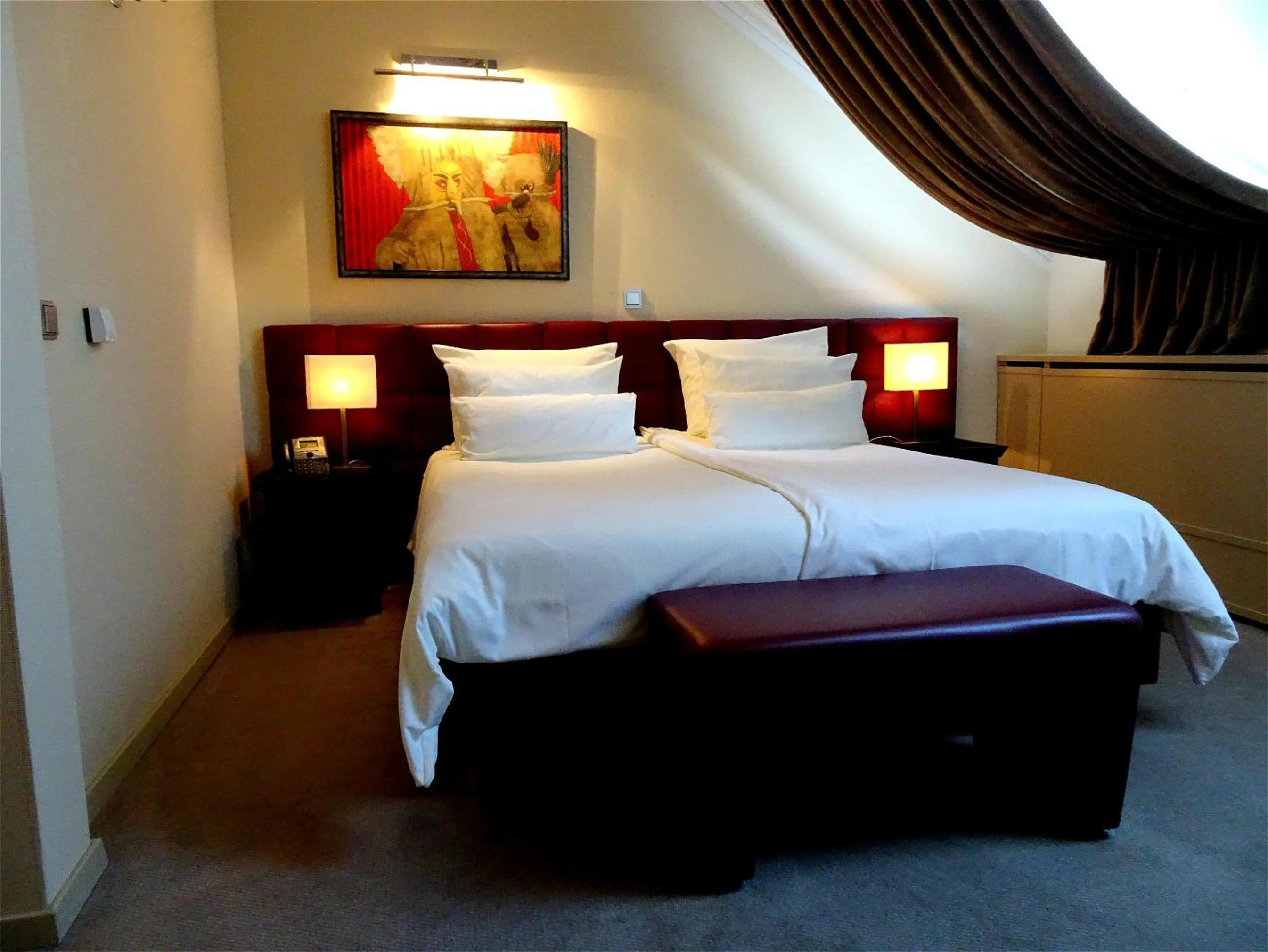 Bed in Hotel Mitra, Story Hotels