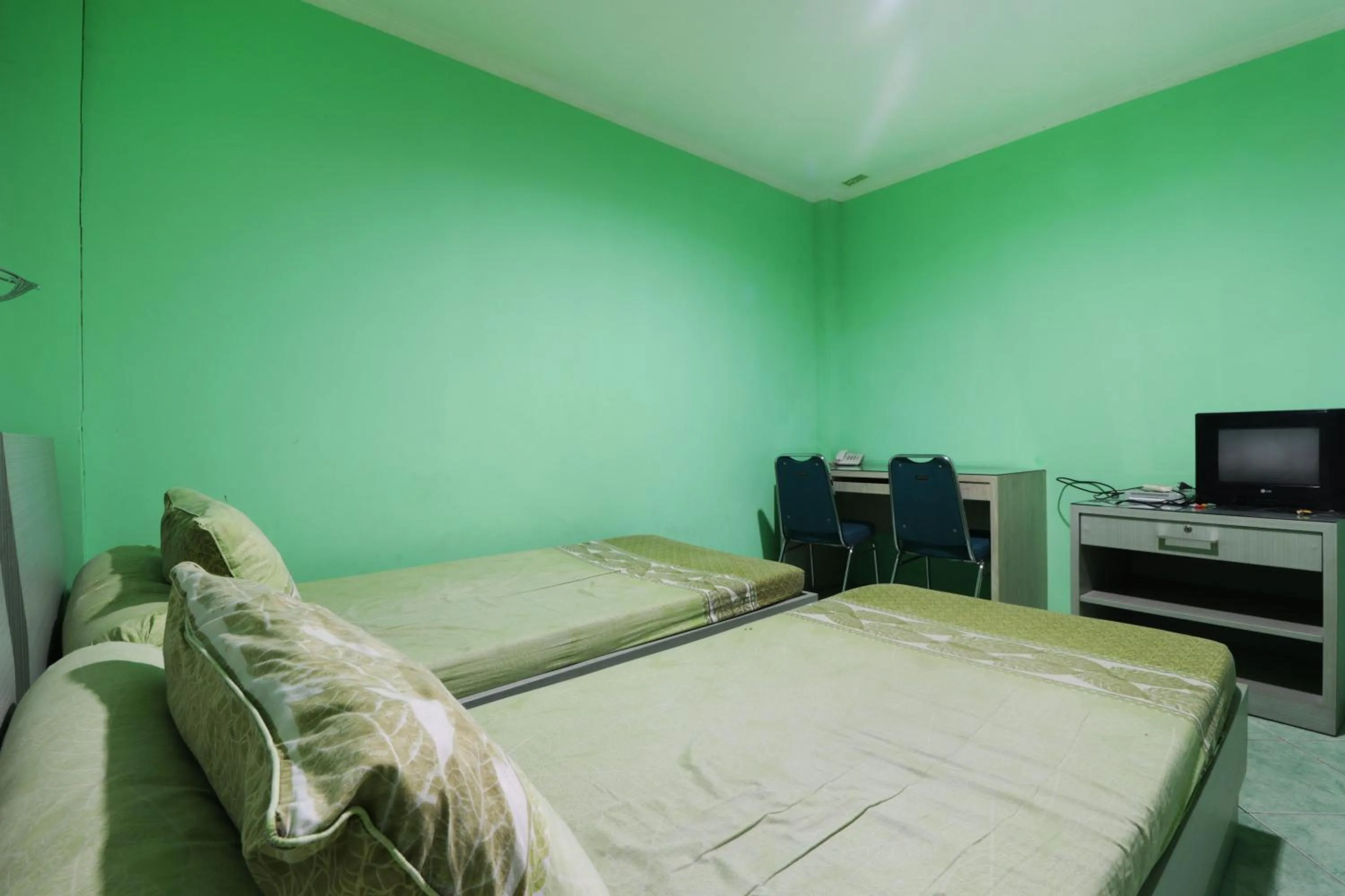 Bedroom, Bed in Wisma Aam Syariah