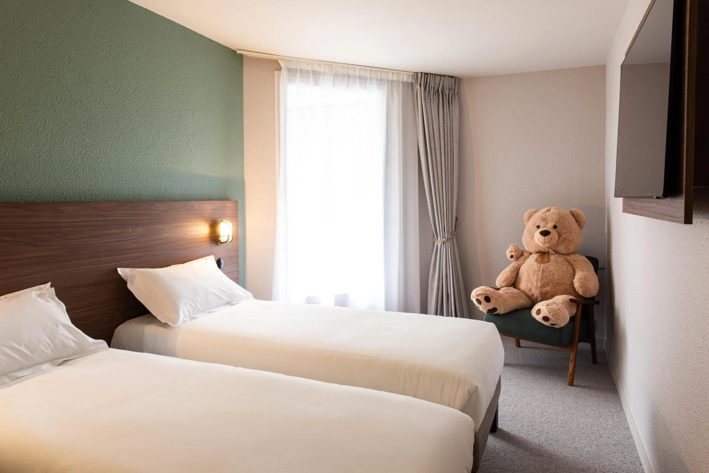 Bed in La Maison OBONO Hôtel & Spa