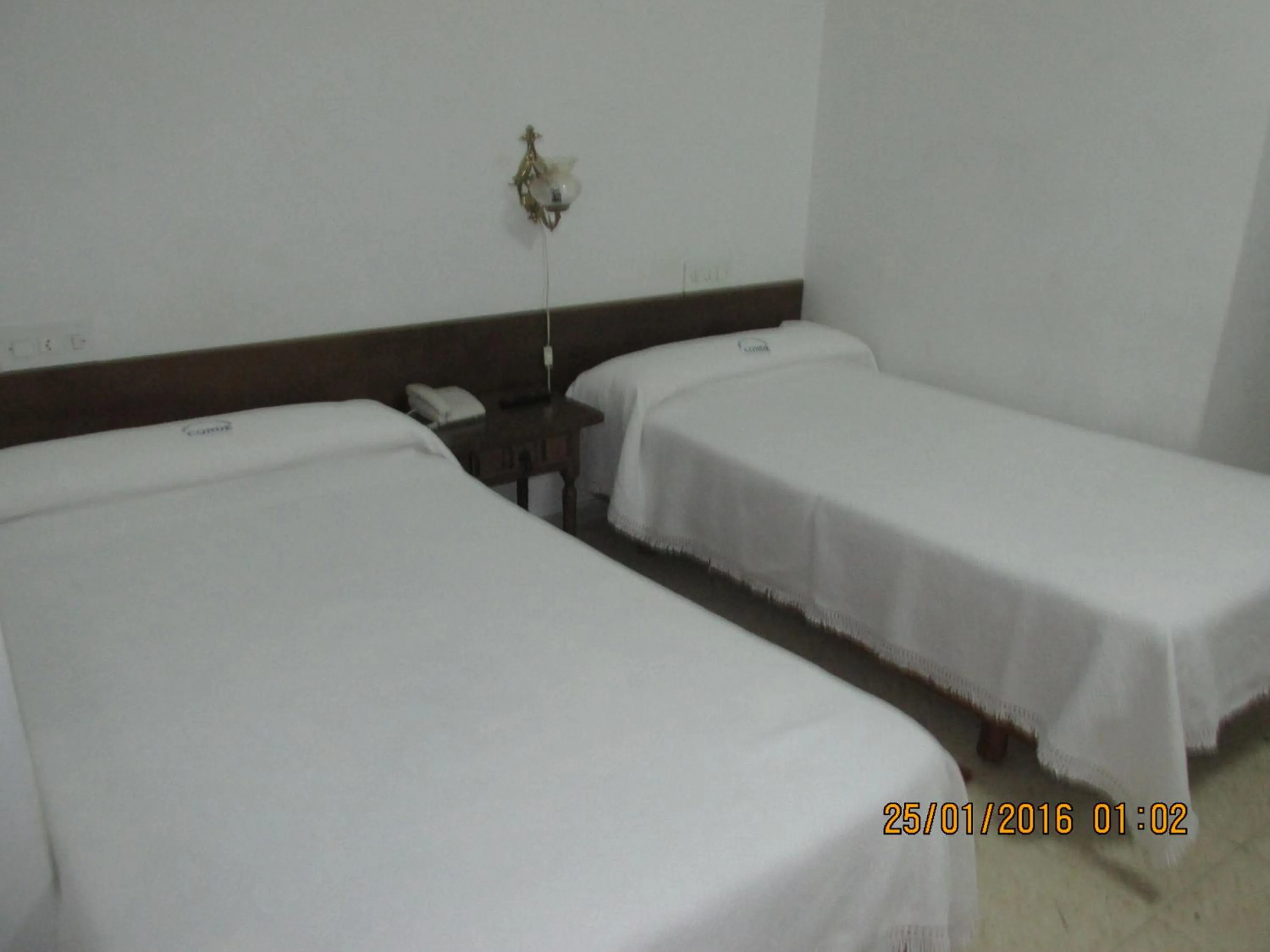Bed in Hotel Conde