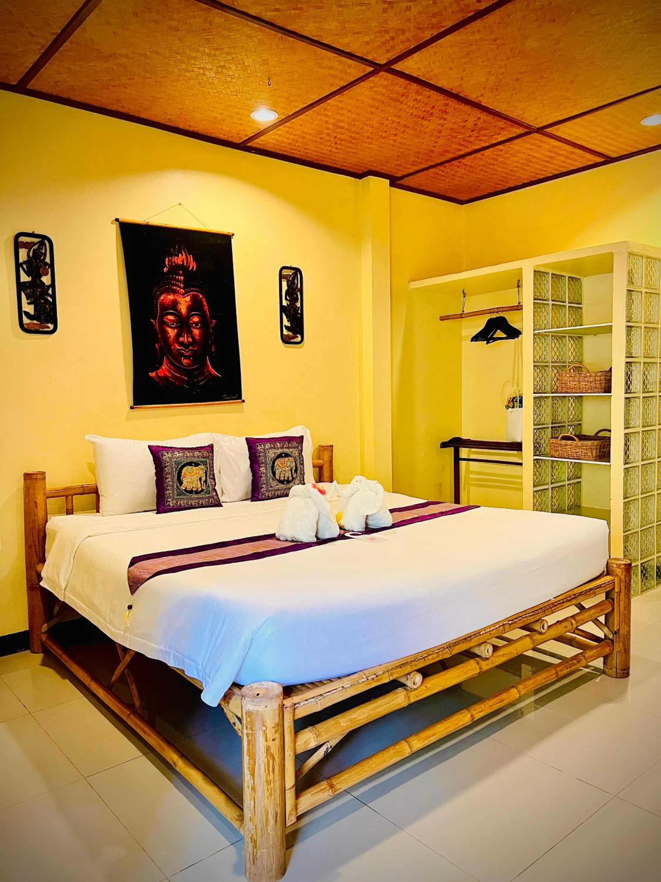 Bed in Baan Ton Rak Boutique Resort