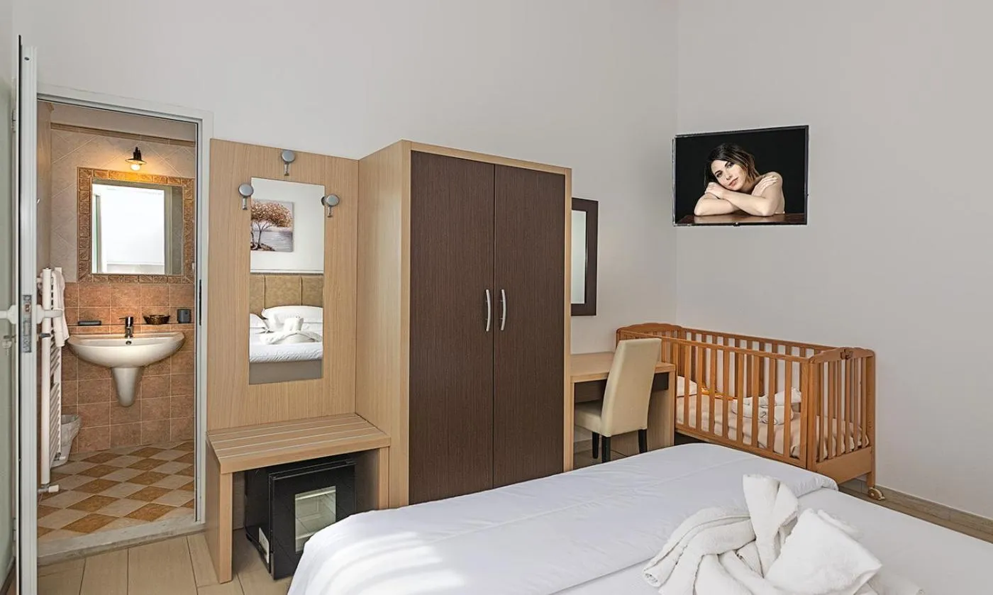 Bedroom in Hotel Virginia