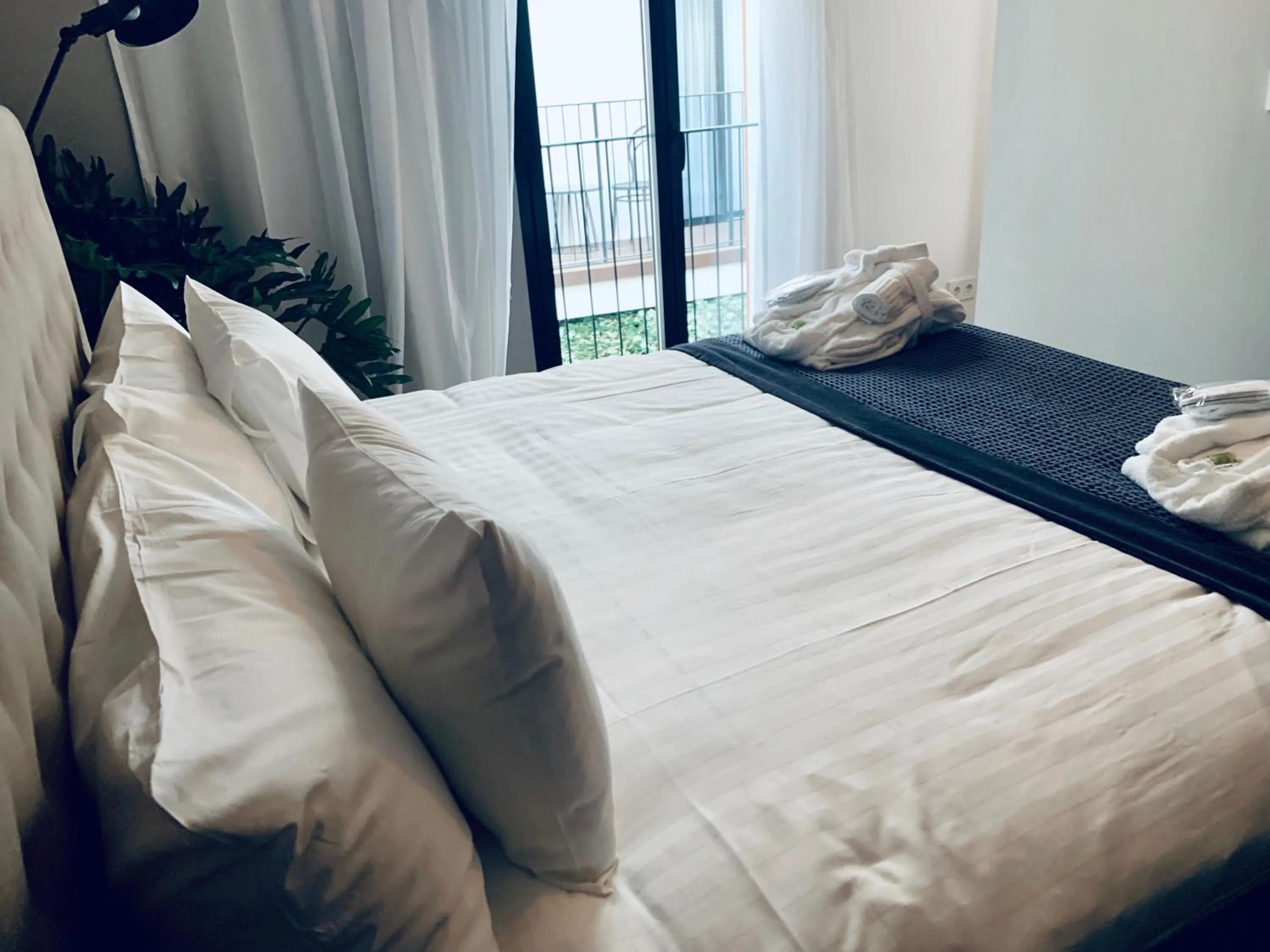 Bed in Terreno Suites