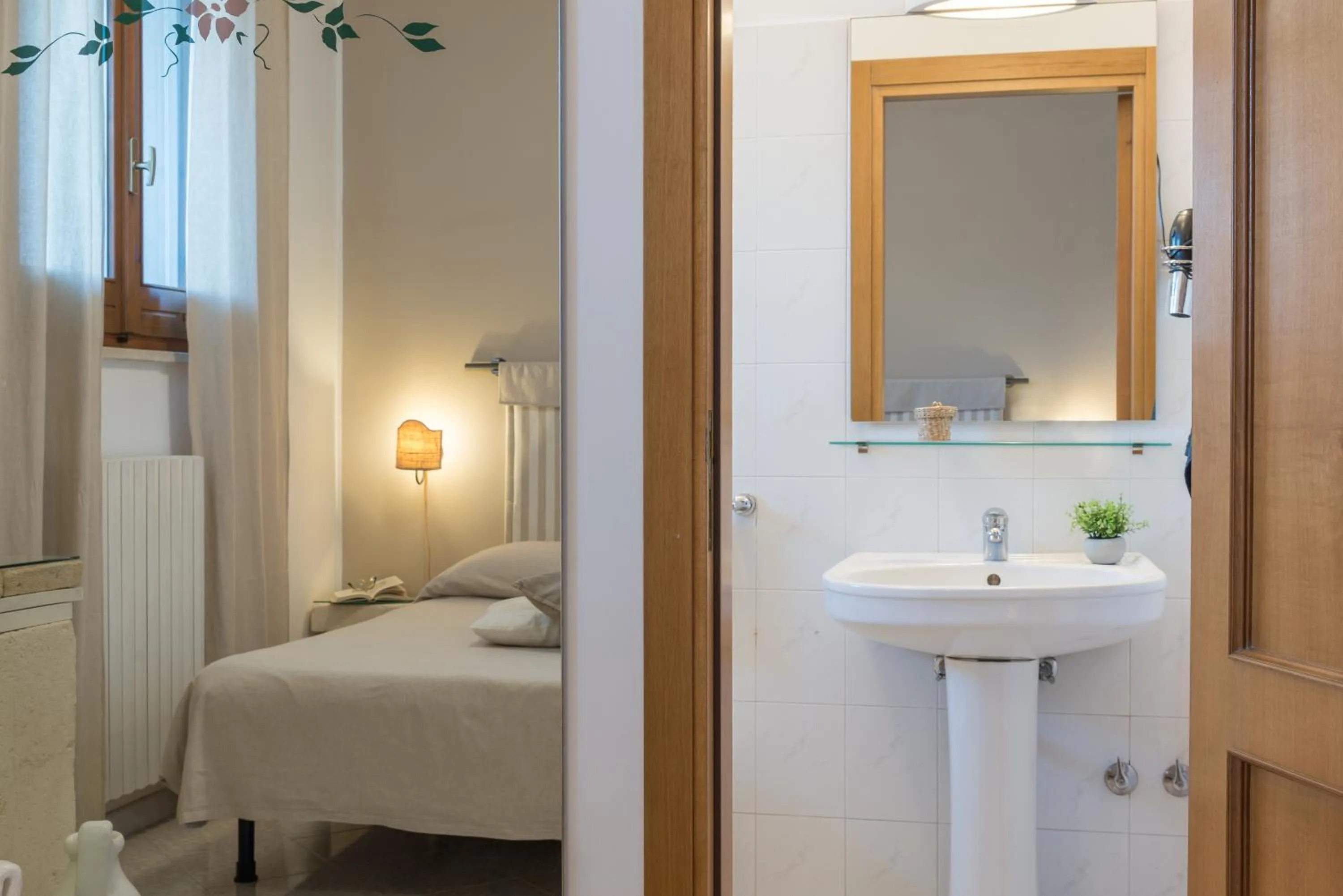 Bed in Piccolo Hotel Villa Rosa