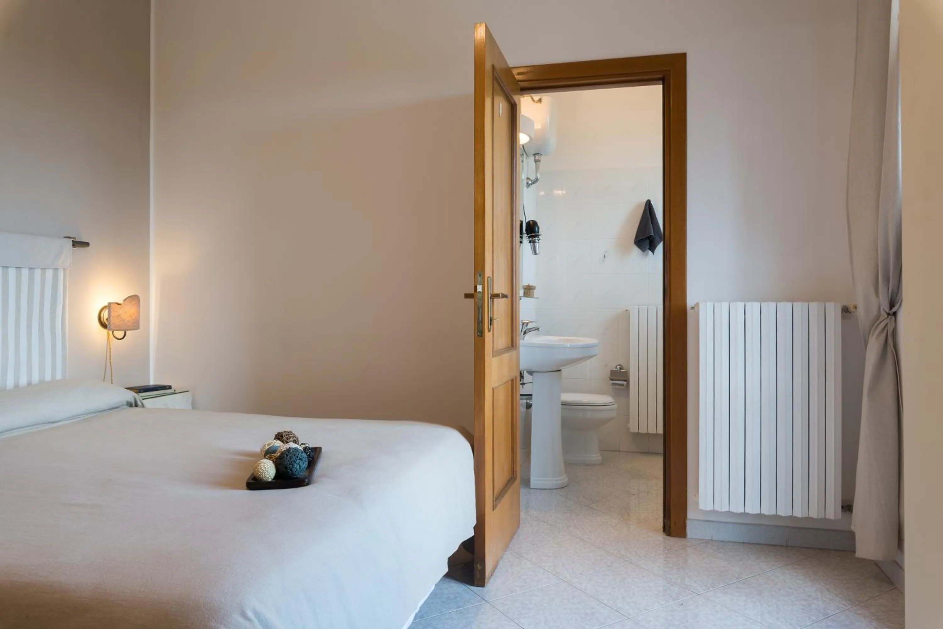 Bed in Piccolo Hotel Villa Rosa