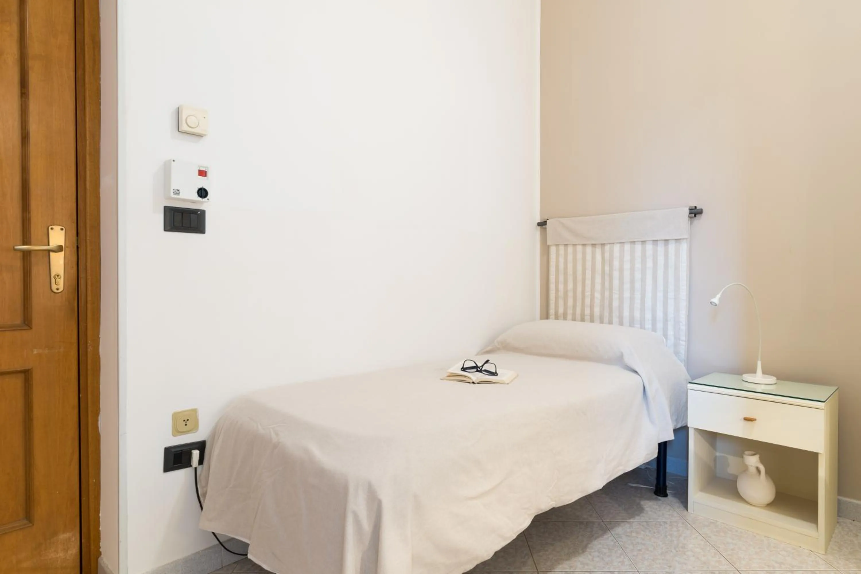 Bed in Piccolo Hotel Villa Rosa