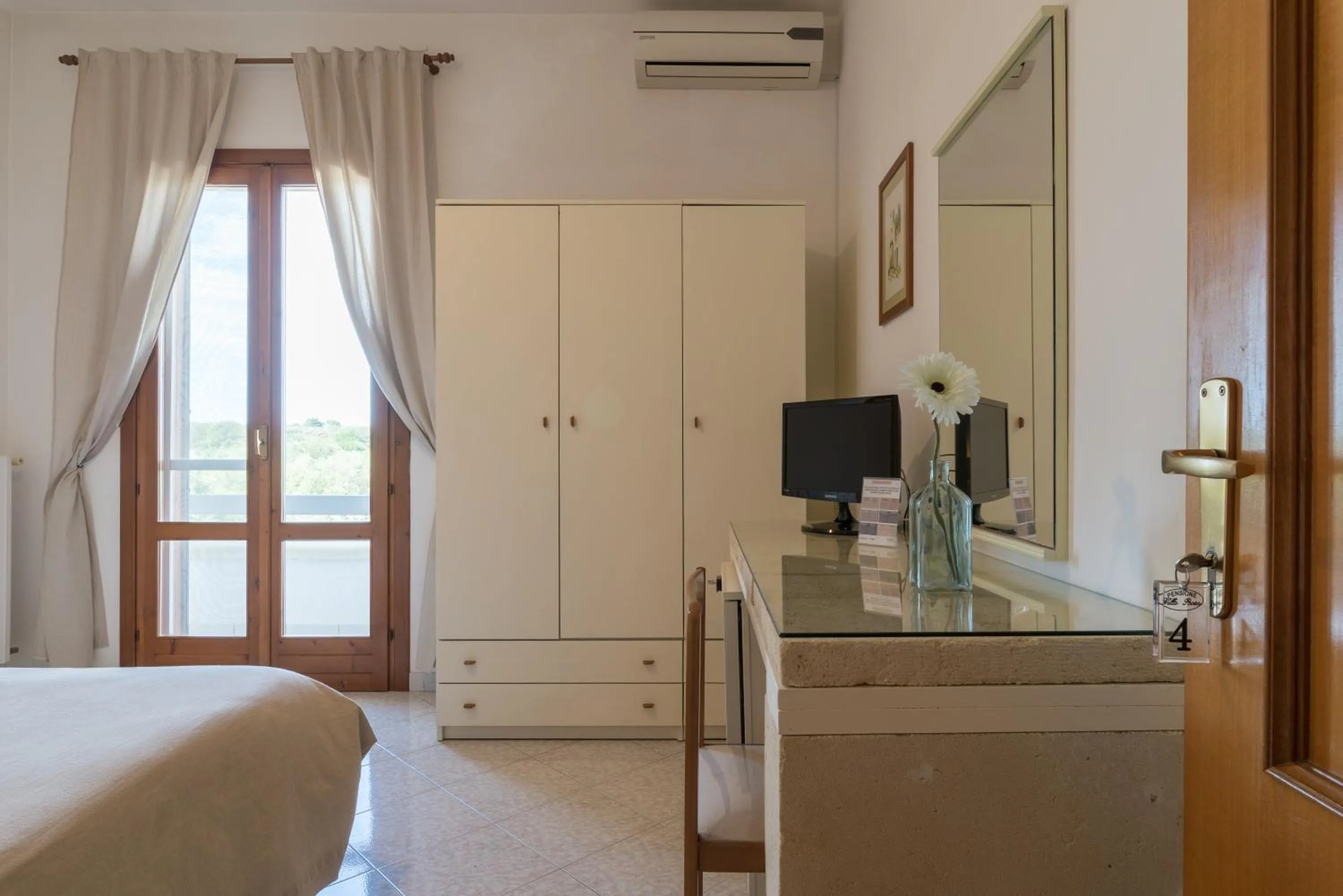 Bed in Piccolo Hotel Villa Rosa