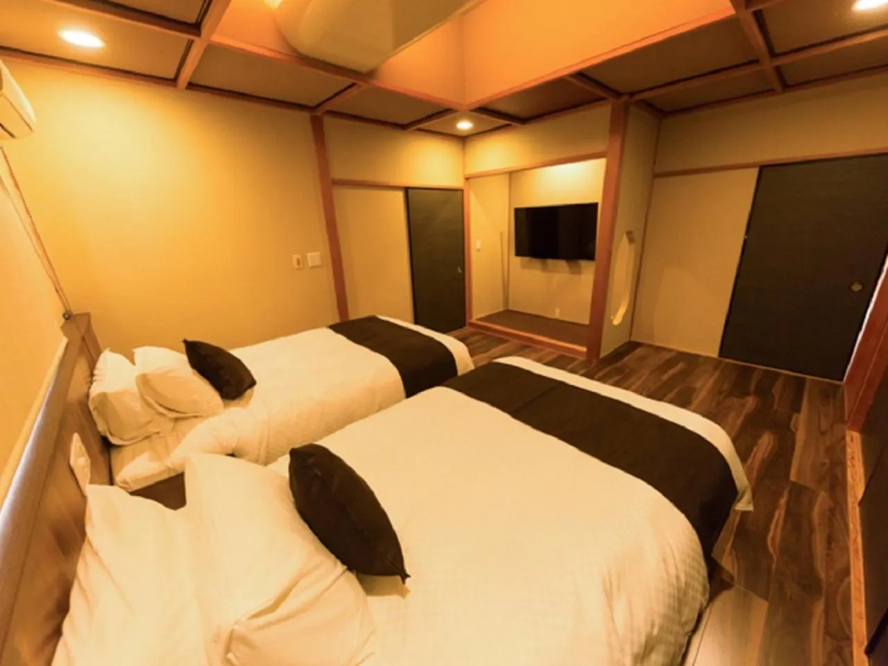 Bed in LiVEMAX RESORT Kawaji