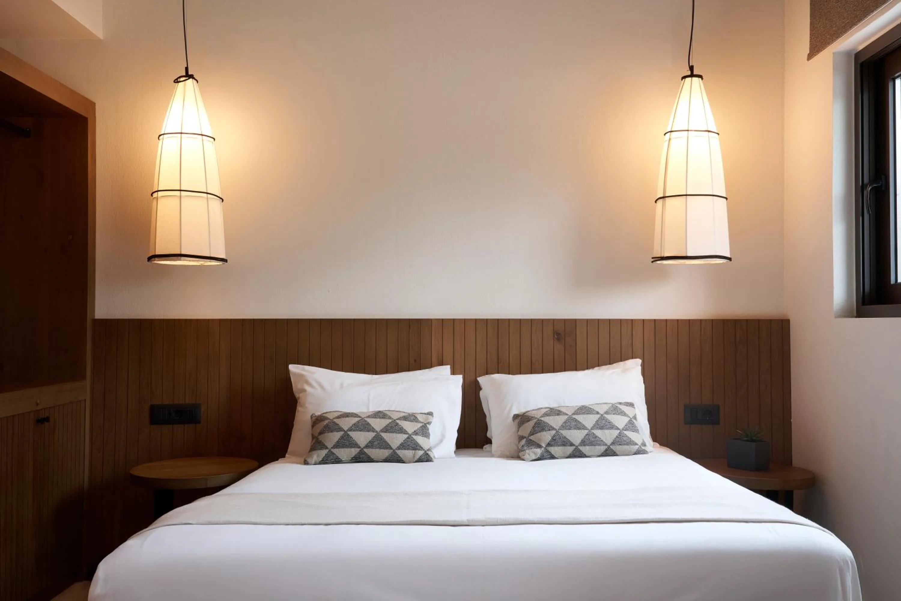 Bed in Stella Village Seaside Hotel