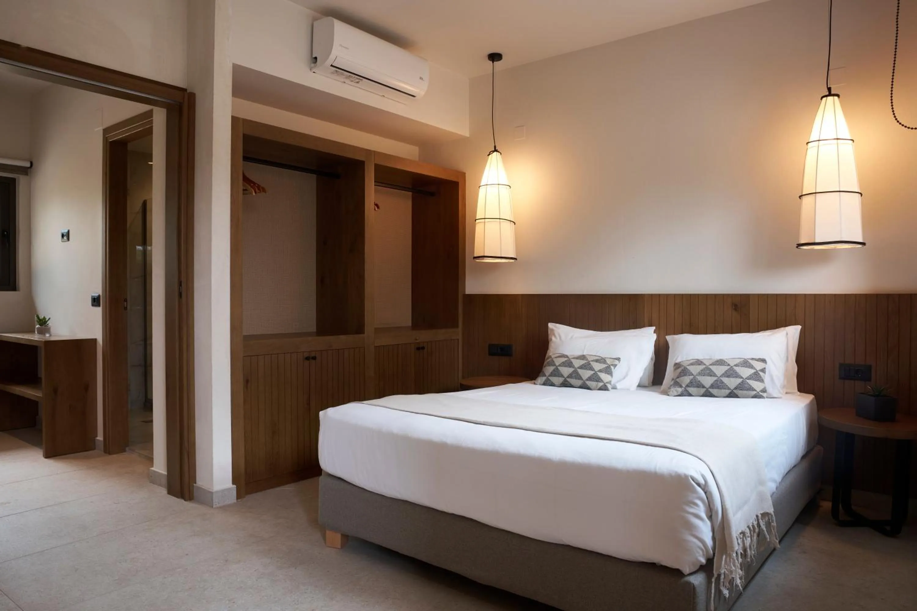 Bed in Stella Village Seaside Hotel