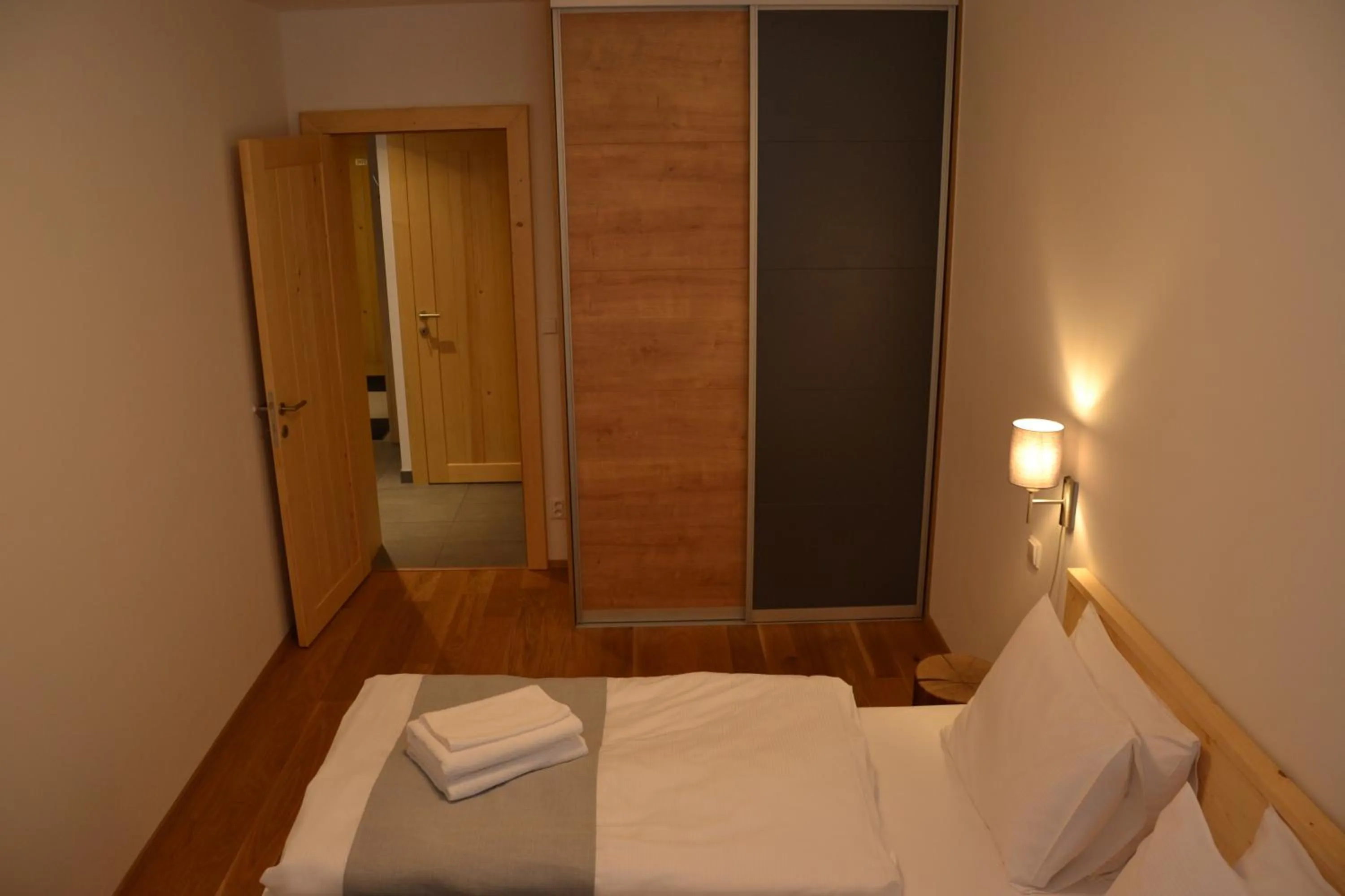 Photo of the whole room, Bed in Residence Post