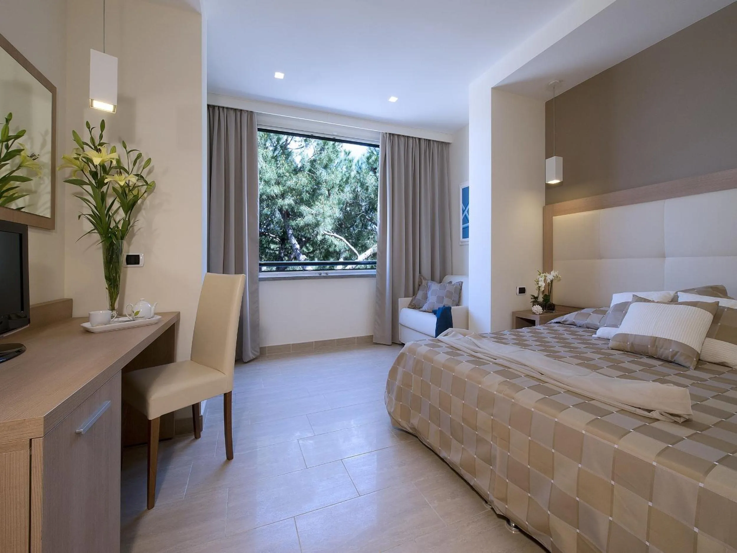 TV and multimedia, Bed in Hotel I Ginepri