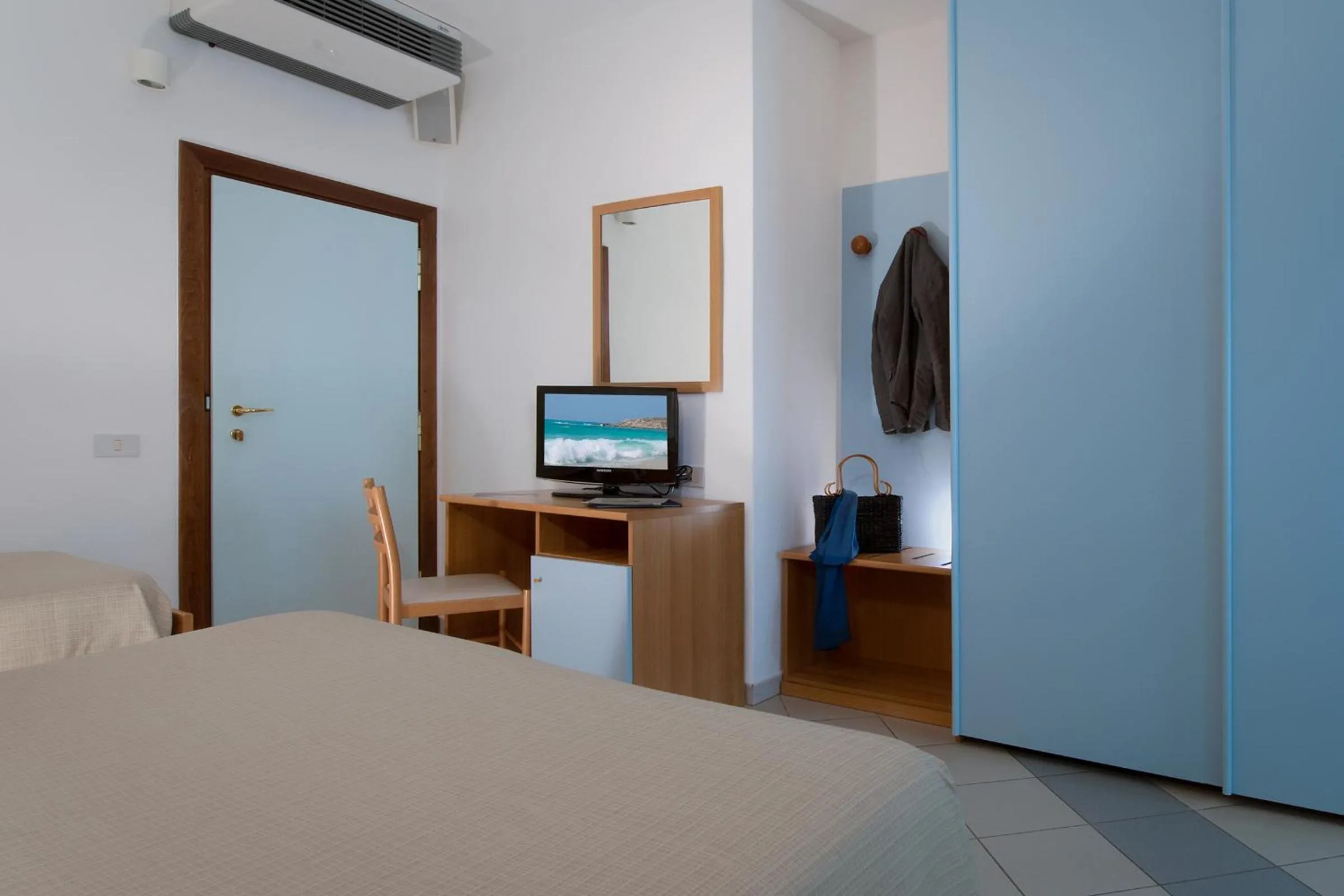 TV and multimedia, Bed in Hotel I Ginepri