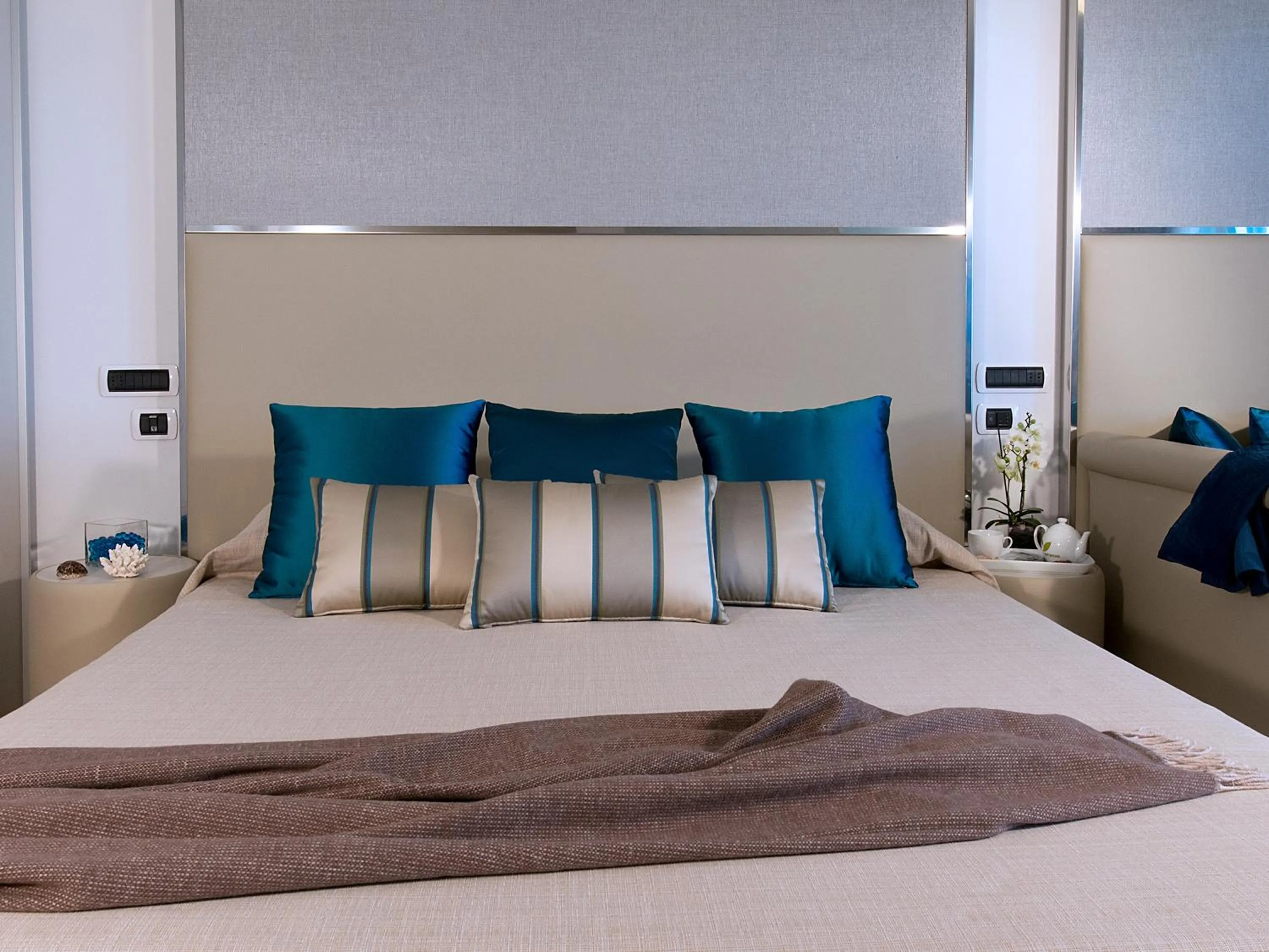 Decorative detail, Bed in Hotel I Ginepri