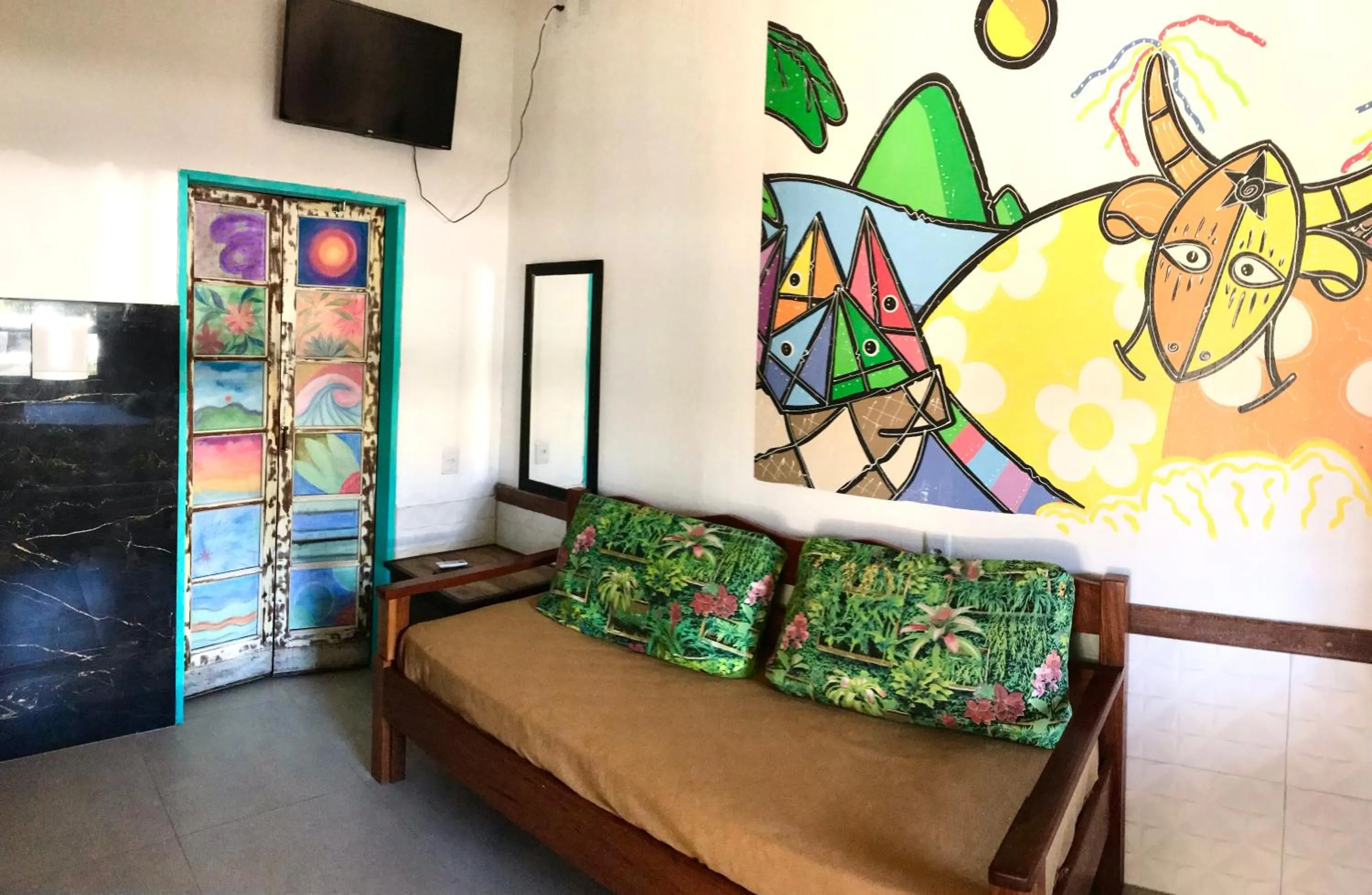 Quadruple Room with Balcony in Amarelo Hibisco