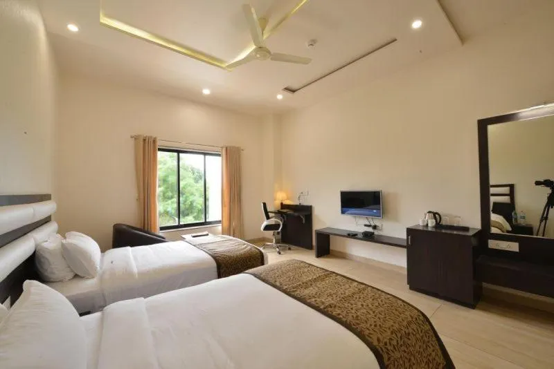Photo of the whole room, Bed in The Fern Residency Parbhani