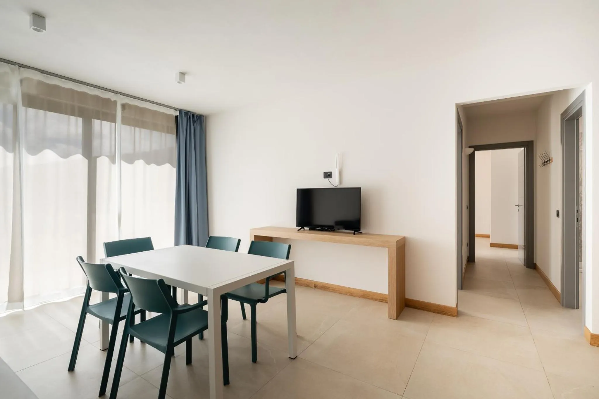 Communal lounge/ TV room in Hotel Delfino