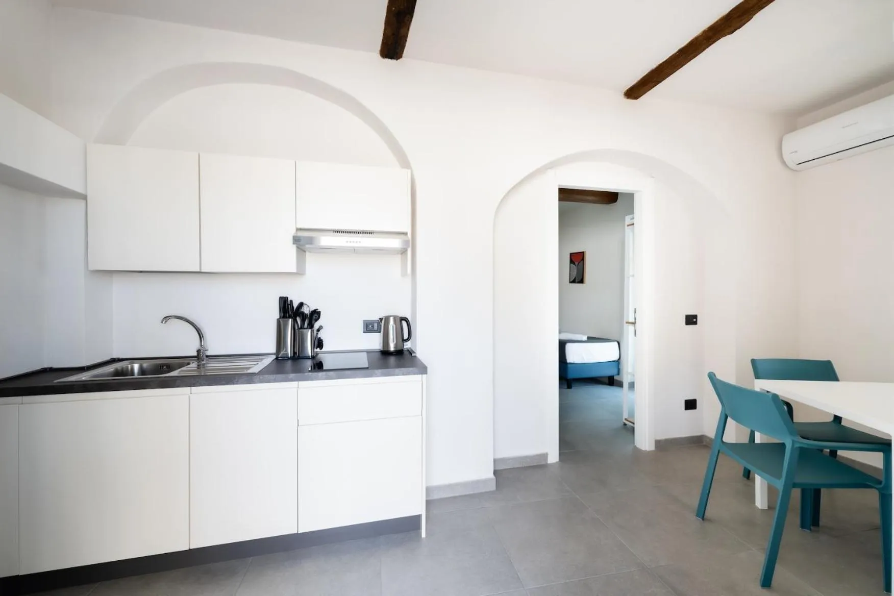Kitchen or kitchenette in Hotel Delfino