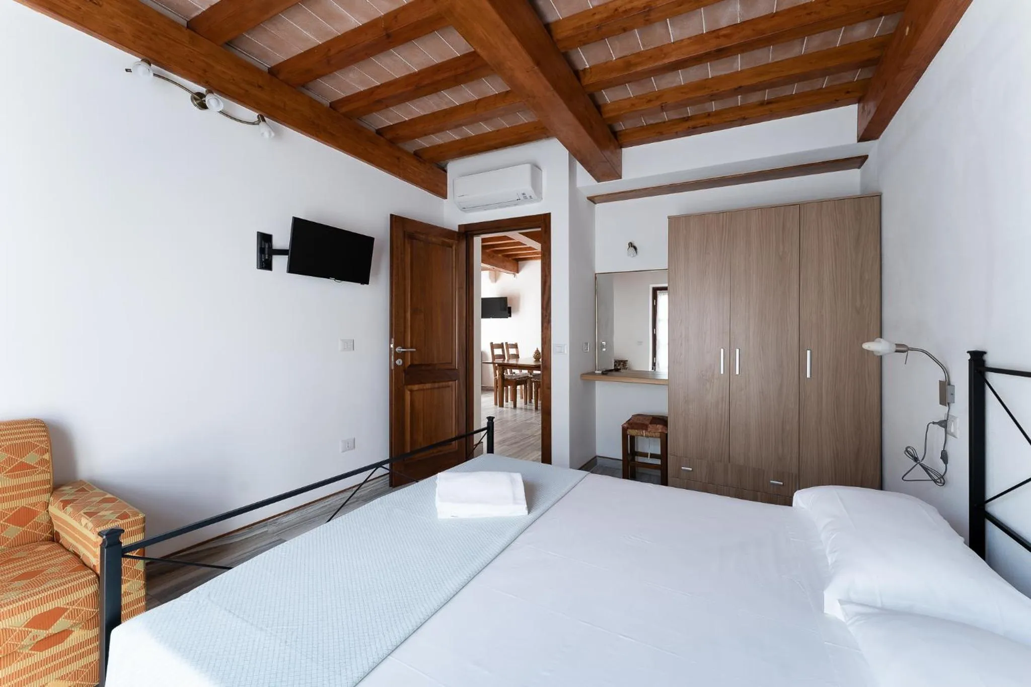 Bed in Hotel Delfino