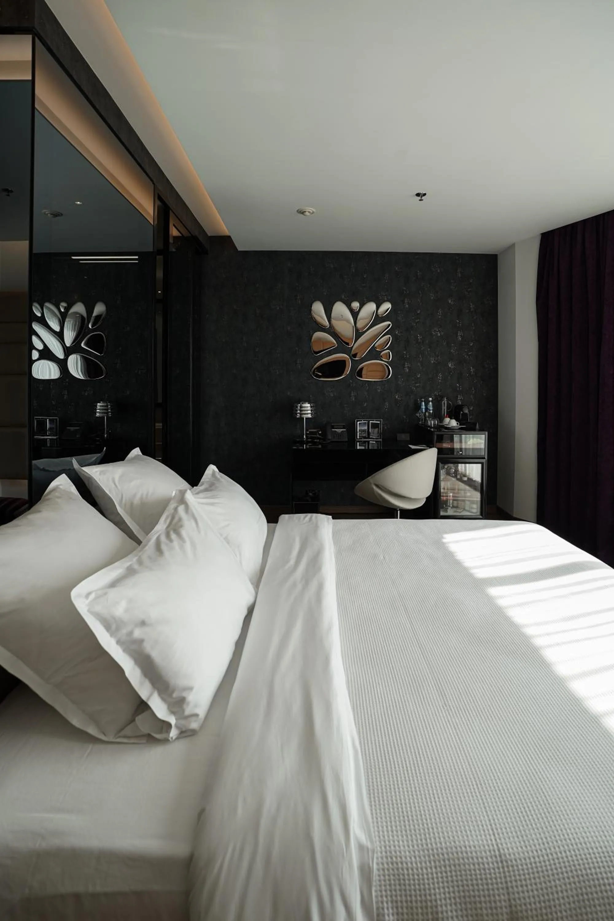 Bed in 11 Mirrors Design Hotel