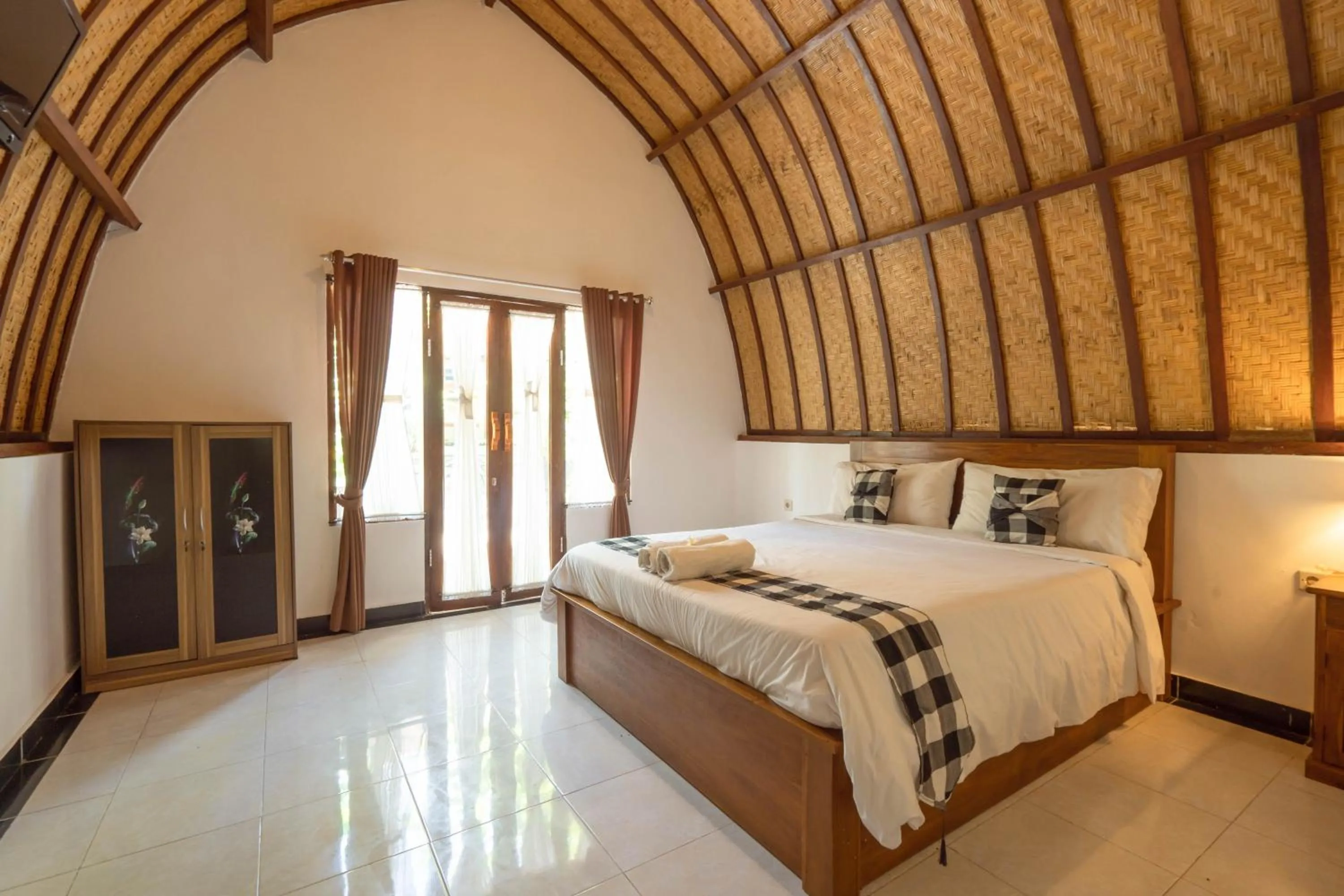 Bedroom, Bed in Ratu Cottage by OurStory Travels