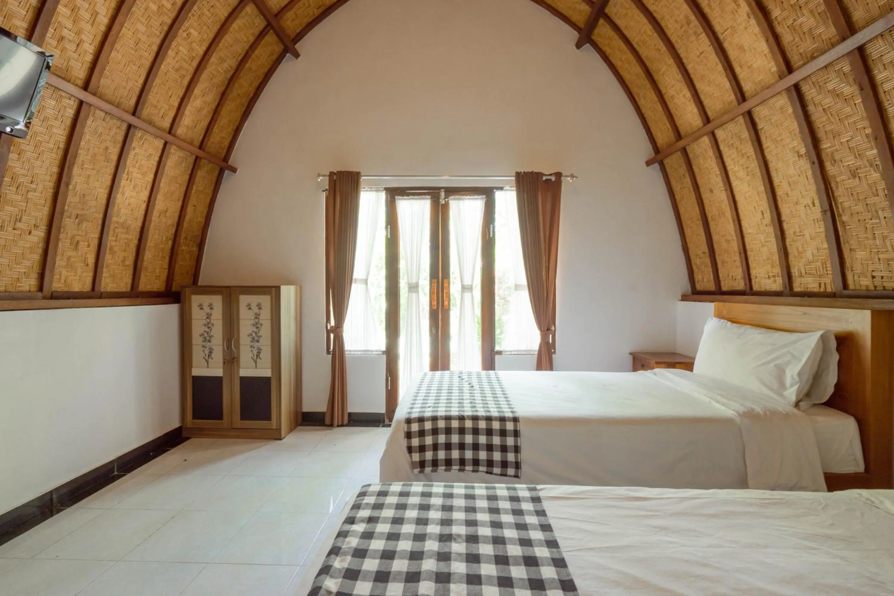 Bedroom, Bed in Ratu Cottage by OurStory Travels