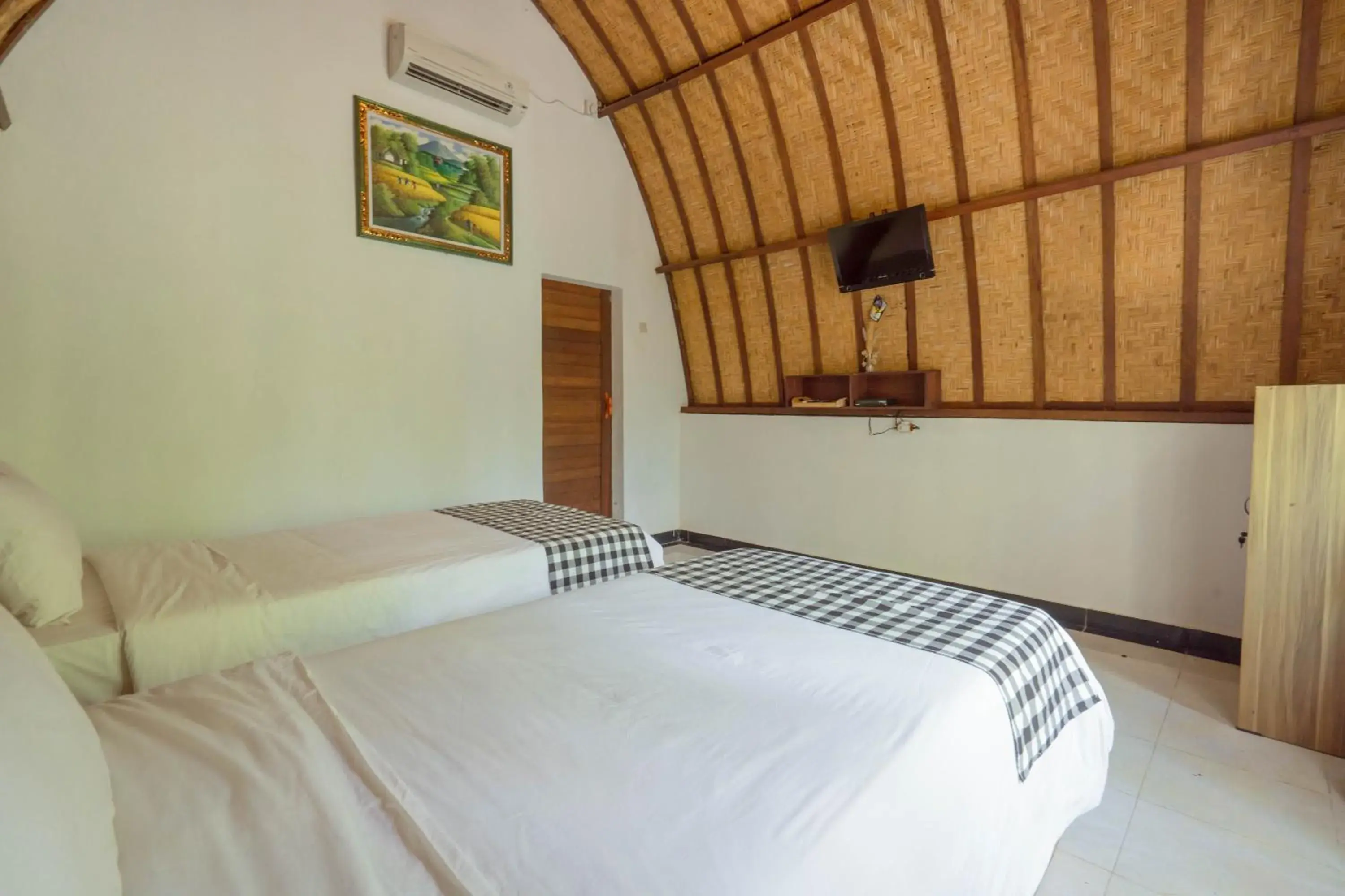 Twin Room with Garden View in Ratu Cottage by OurStory Travels Twin Room with Garden View in Ratu Cottage by OurStory Travels