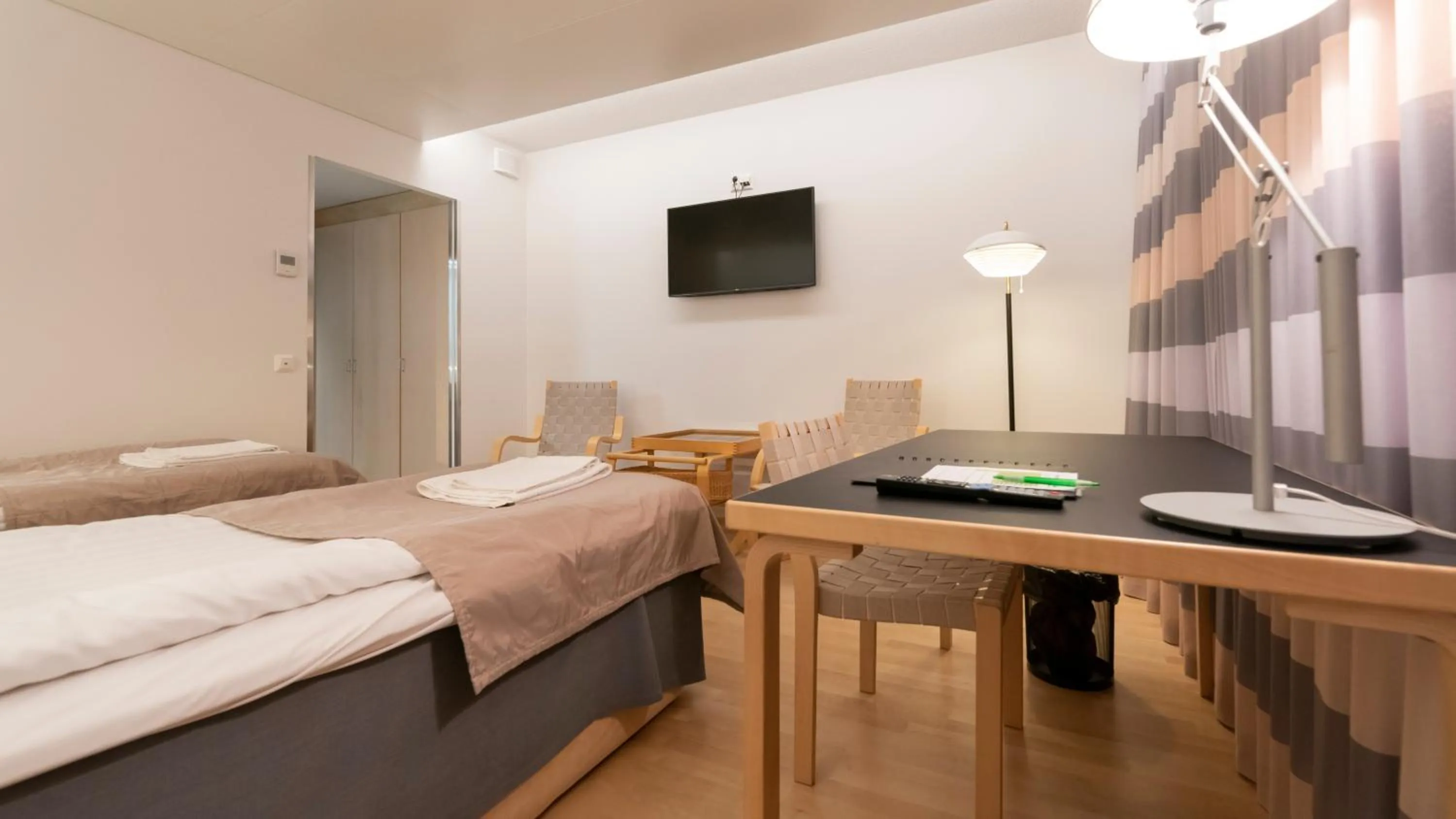 Bed in Kokoushotelli Murikanranta