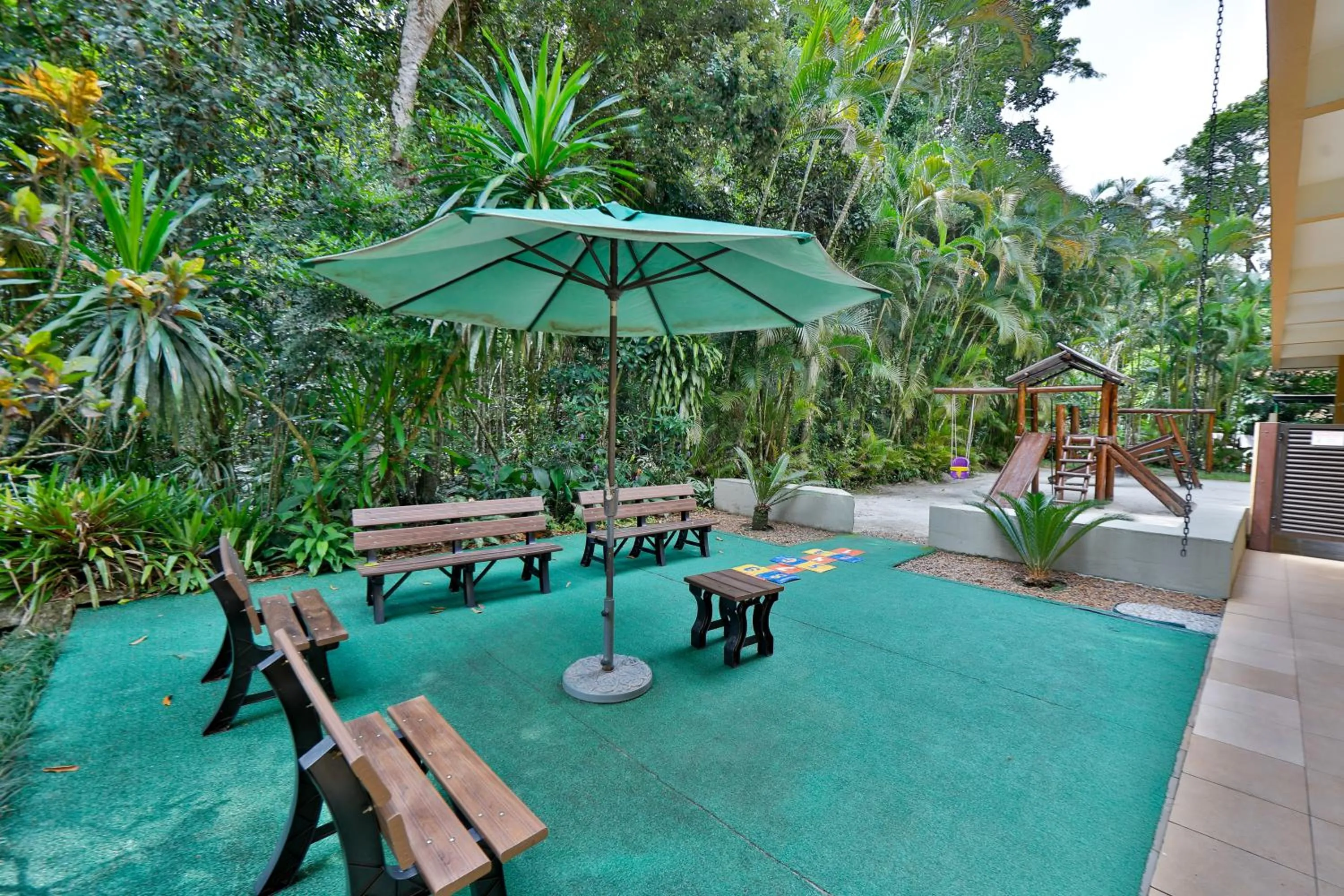 Patio in Flat estudio 110 Amarilis Riviera de São Lourenço, 03 piscina climatizada, serviço de hotelaria, limpesa e troca de toalhas diária, carregador veiculo elétrico e servico de praia finais de semana WiFi 500