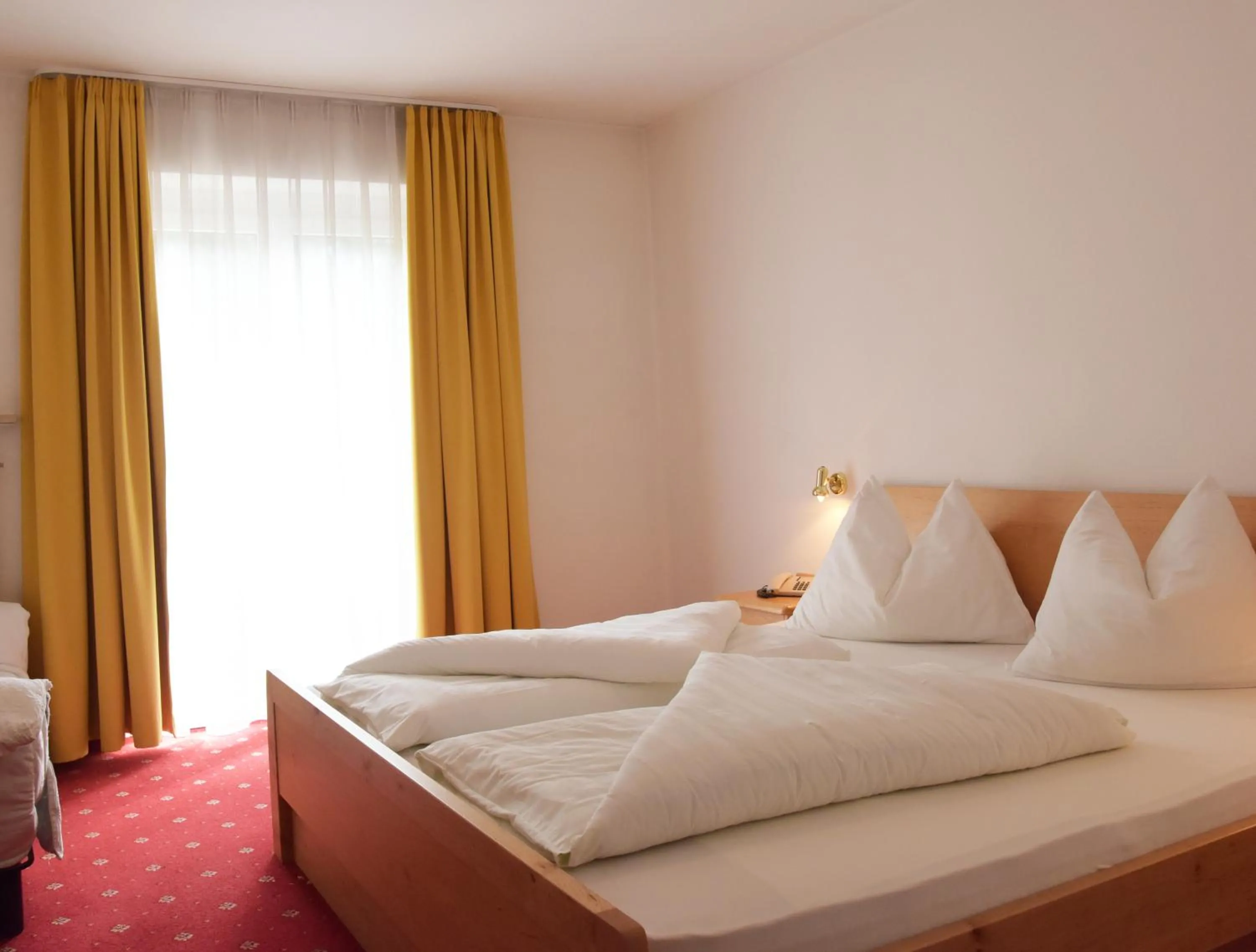 Bed in Hotel Pension Schweitzer