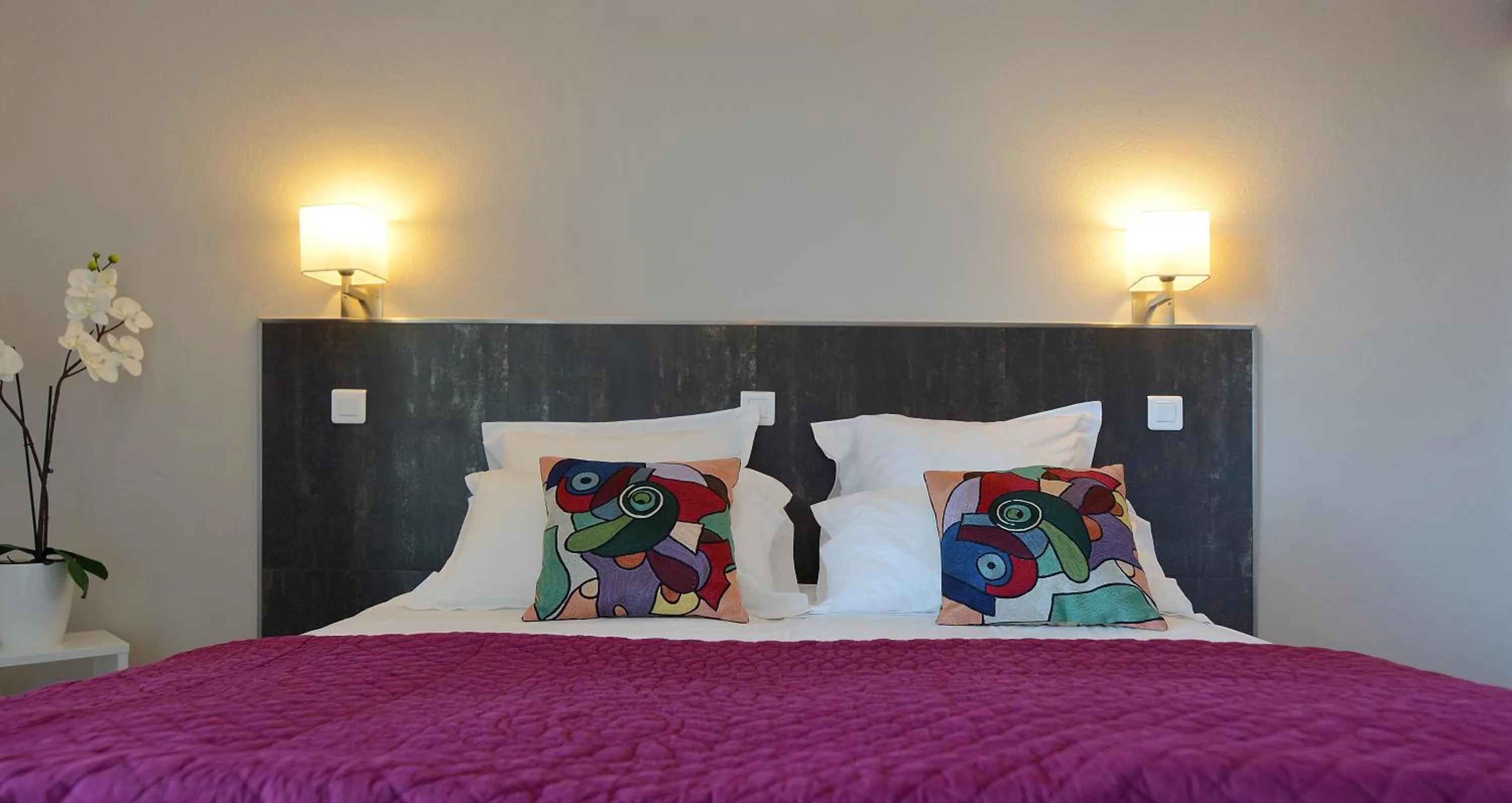 Bed in Hotel Les Eucalyptus