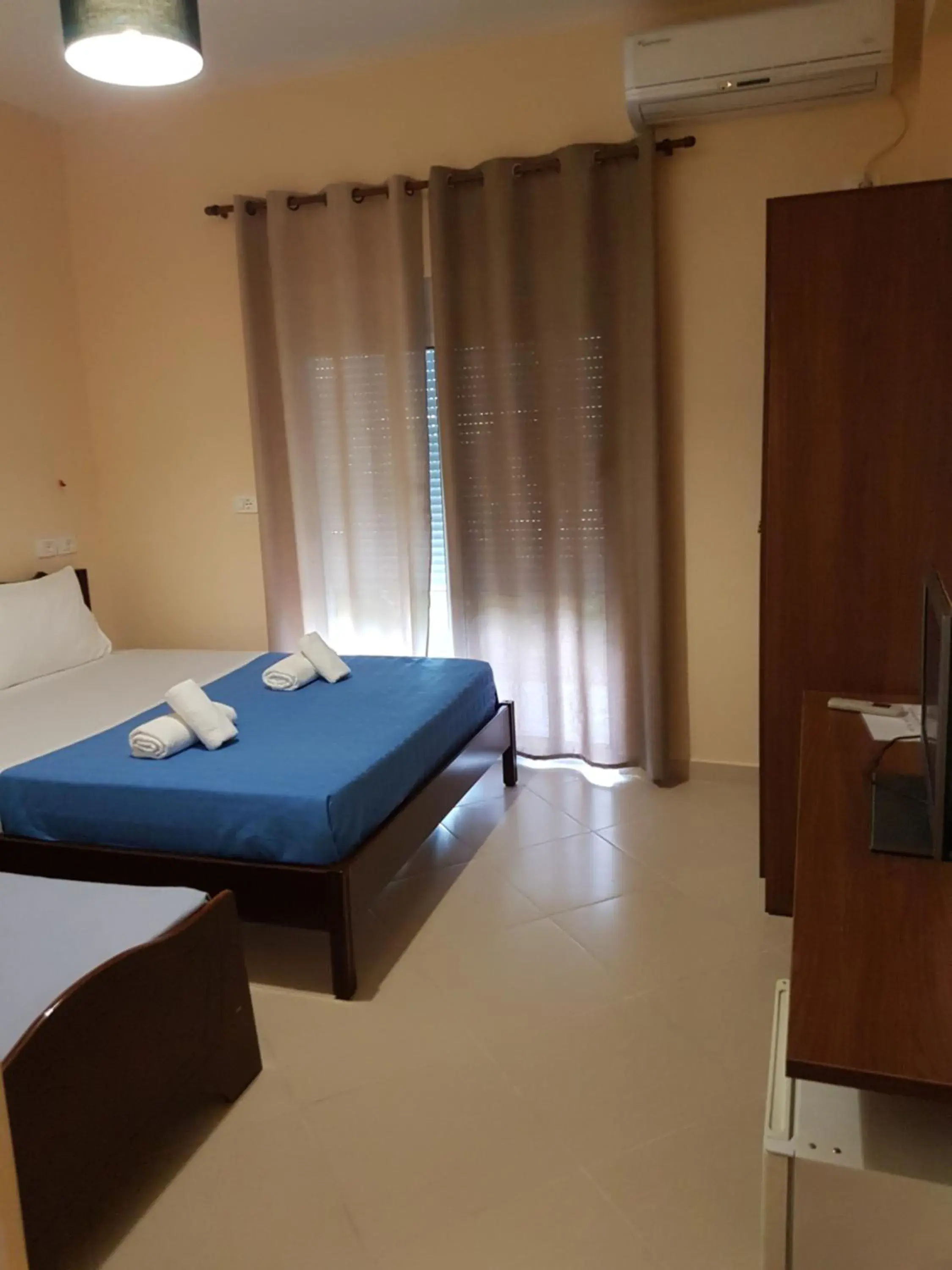 Triple Room with Garden View in Hotel Villa Ago Triple Room with Garden View in Hotel Villa Ago