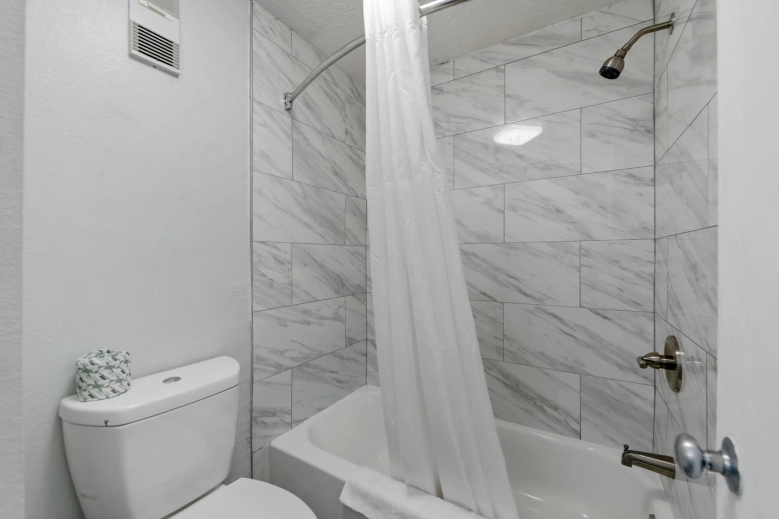 Shower in Budget Inn-Norfolk, VA - Oceanview