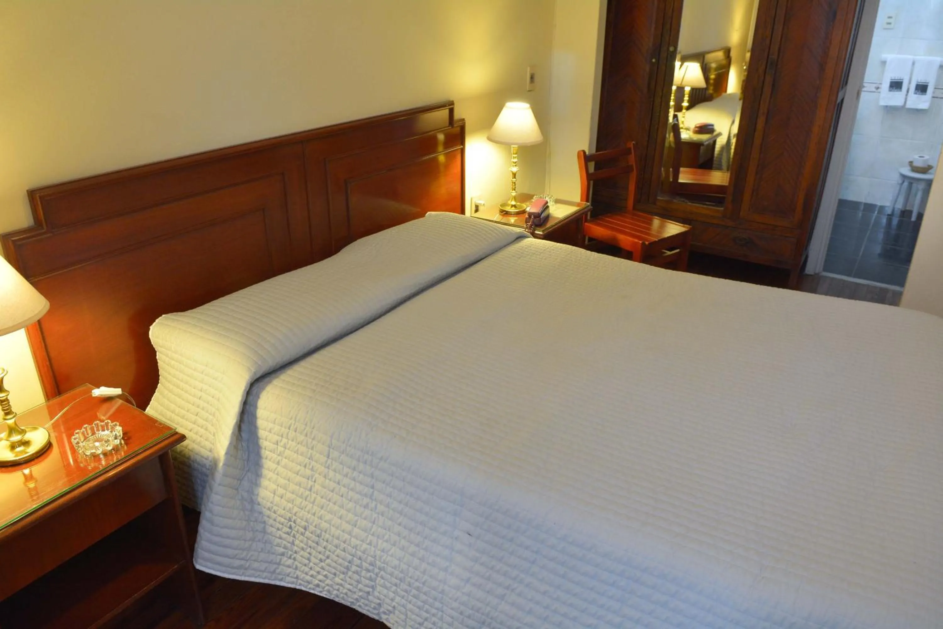 Bed in Hotel Palacio