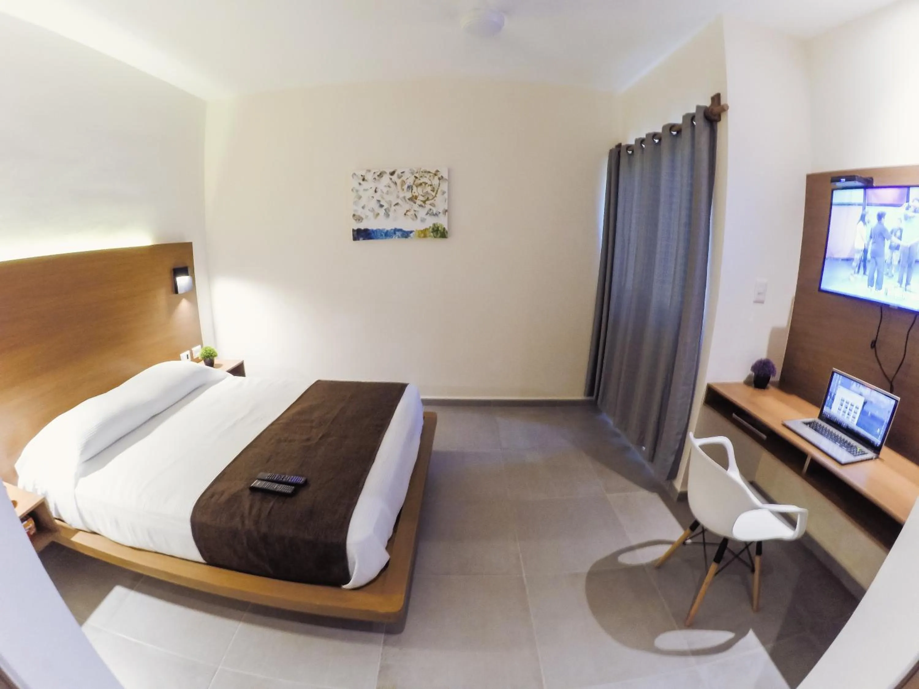 Bed in Viento Suites Cancún