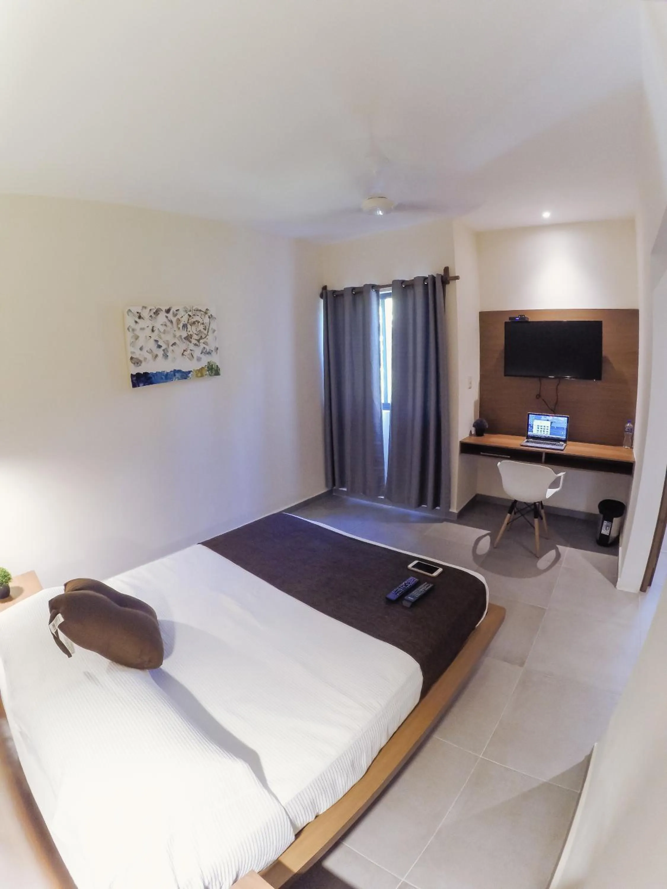 Bed in Viento Suites Cancún