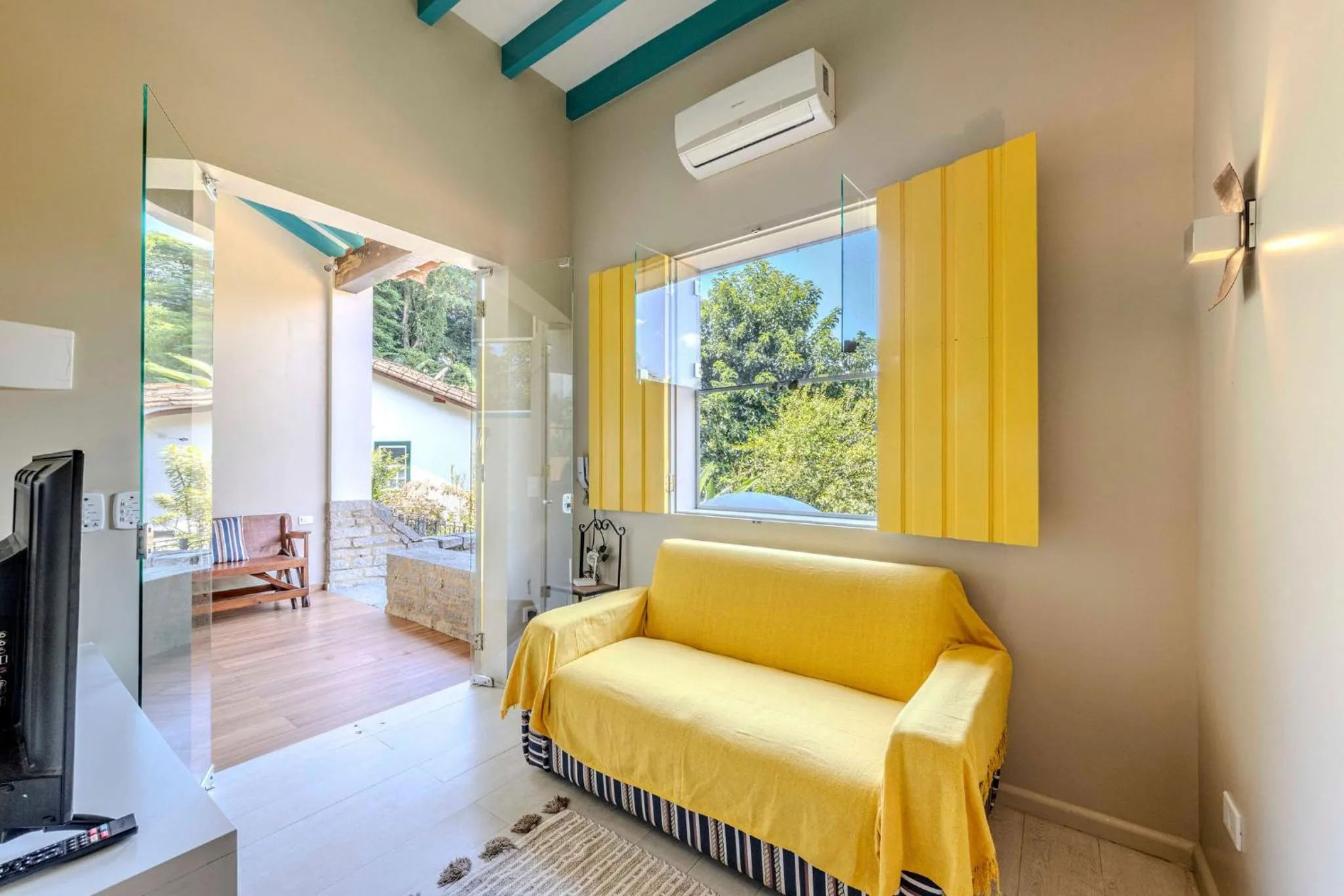 Communal lounge/ TV room in Casa Condominio Piccola Paraty