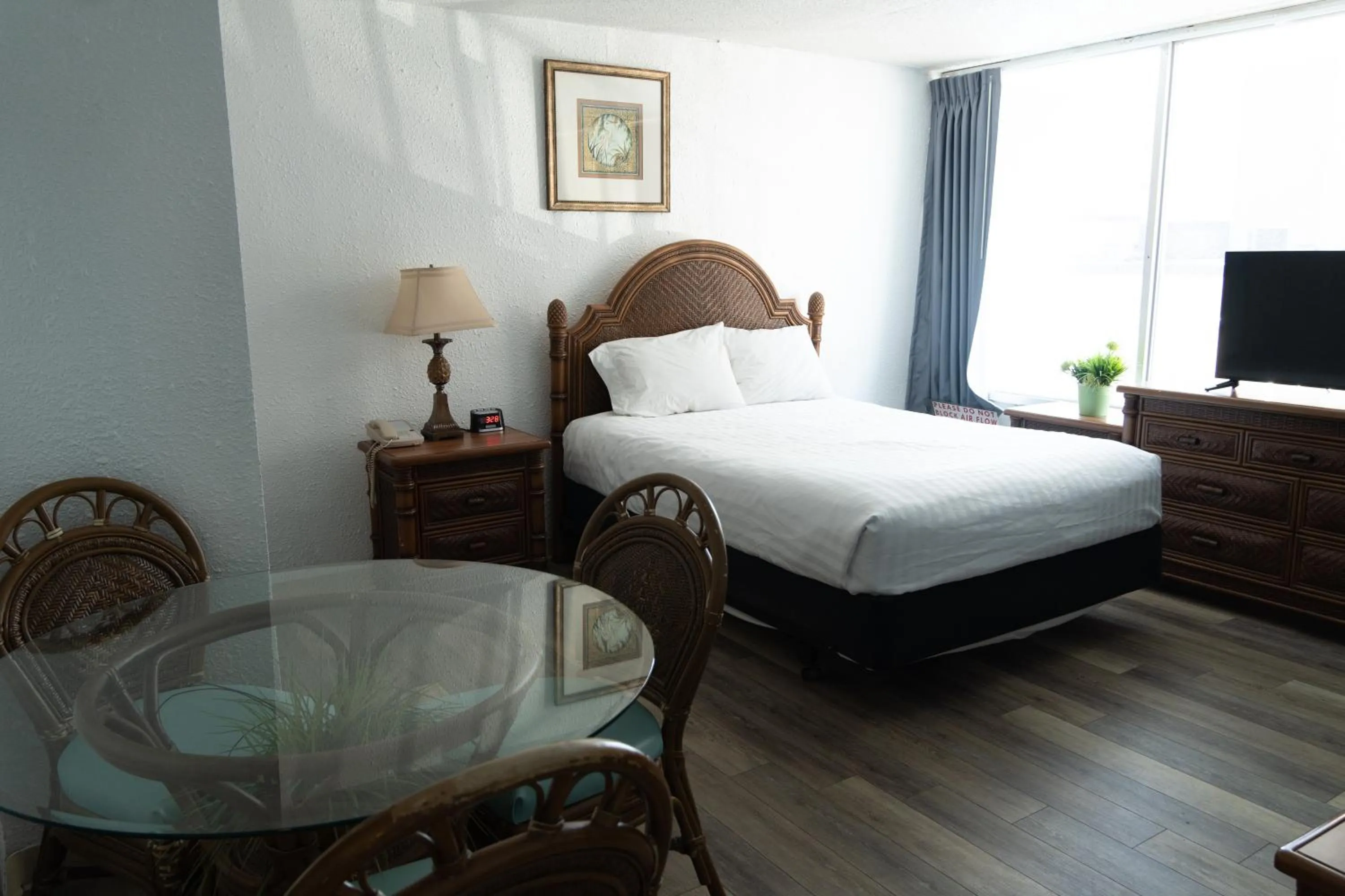 Bed in Beach Club at Montego Inn