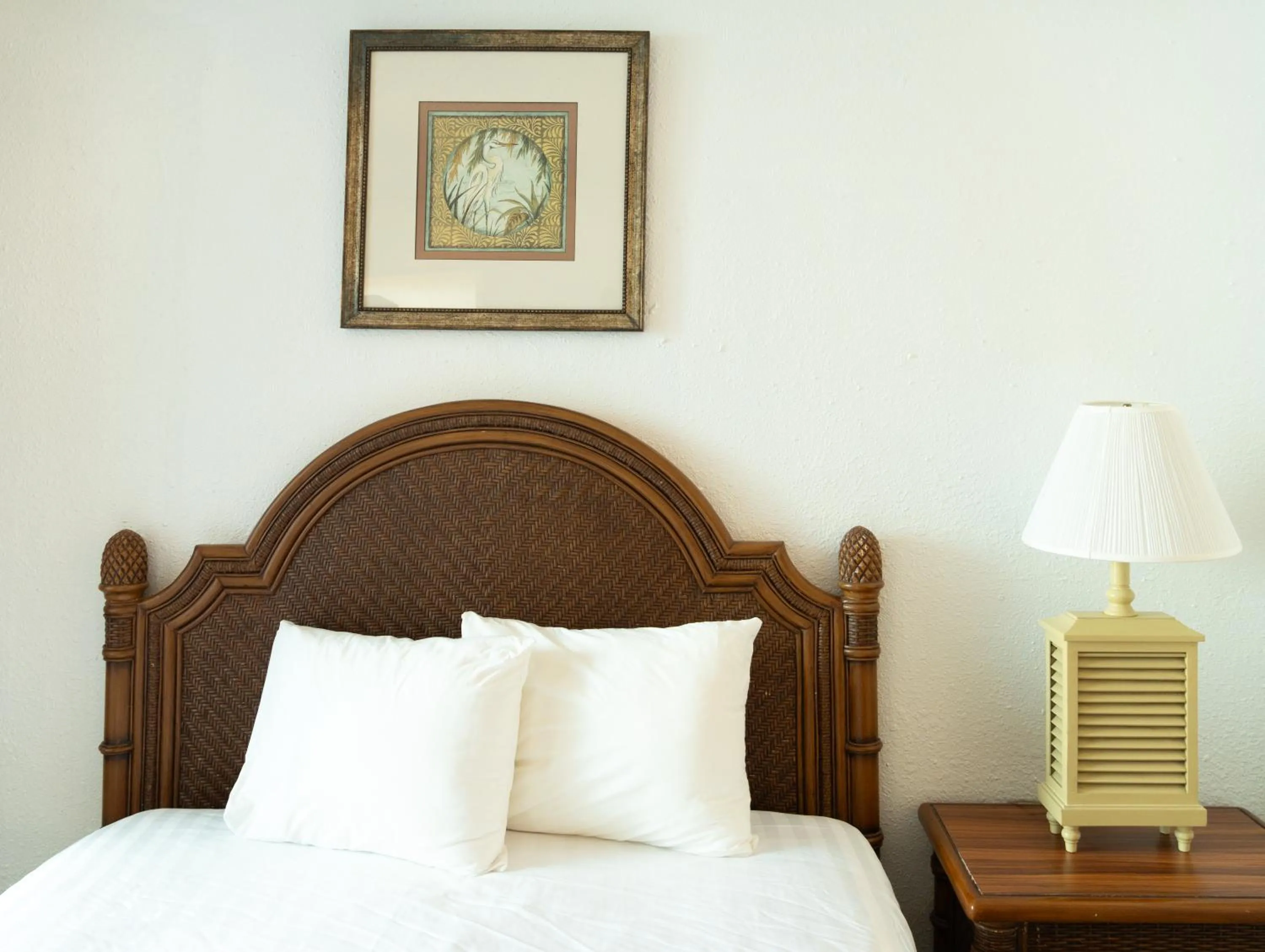 Bed in Beach Club at Montego Inn