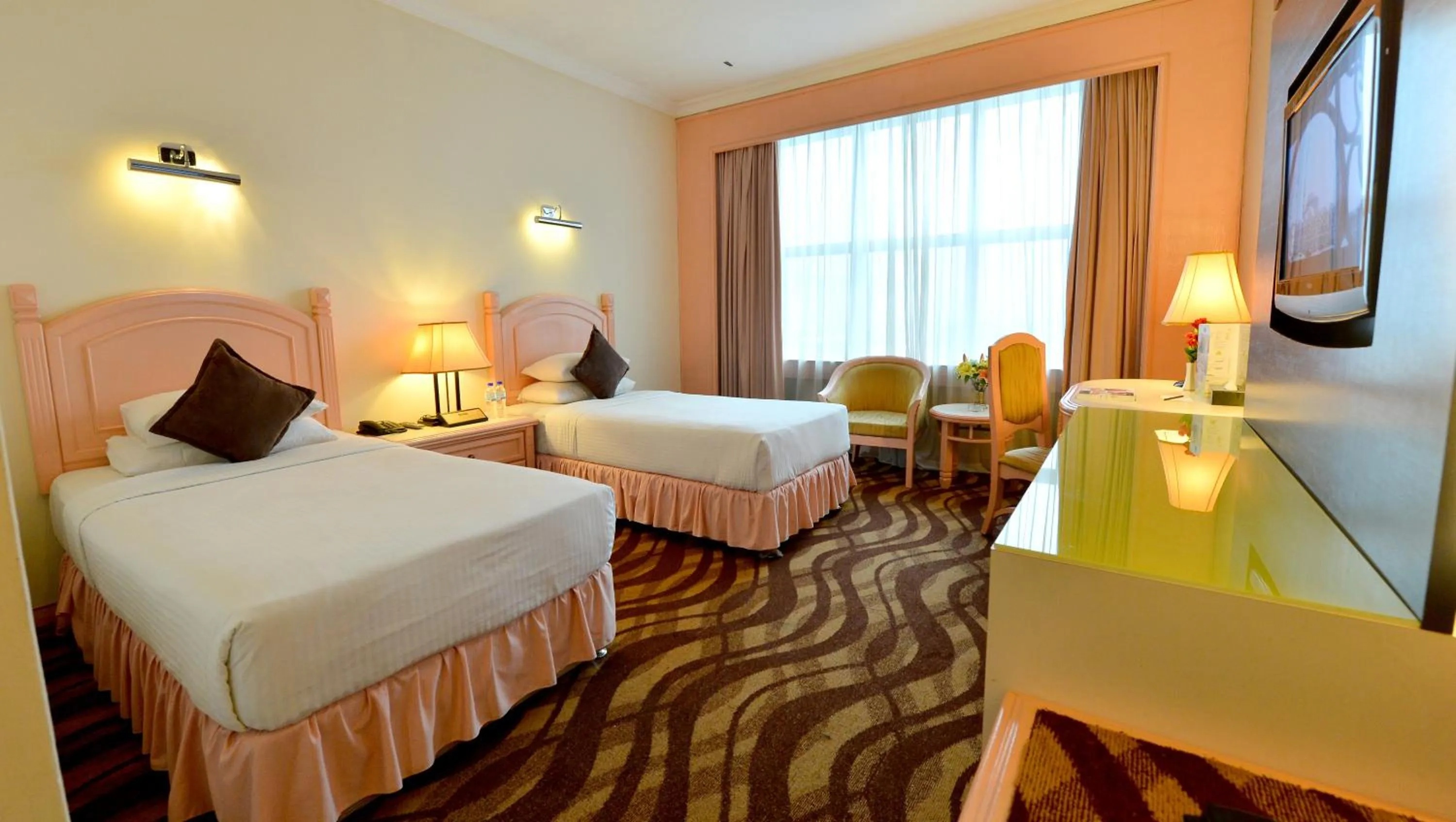 Bed in Emerald Puteri Hotel