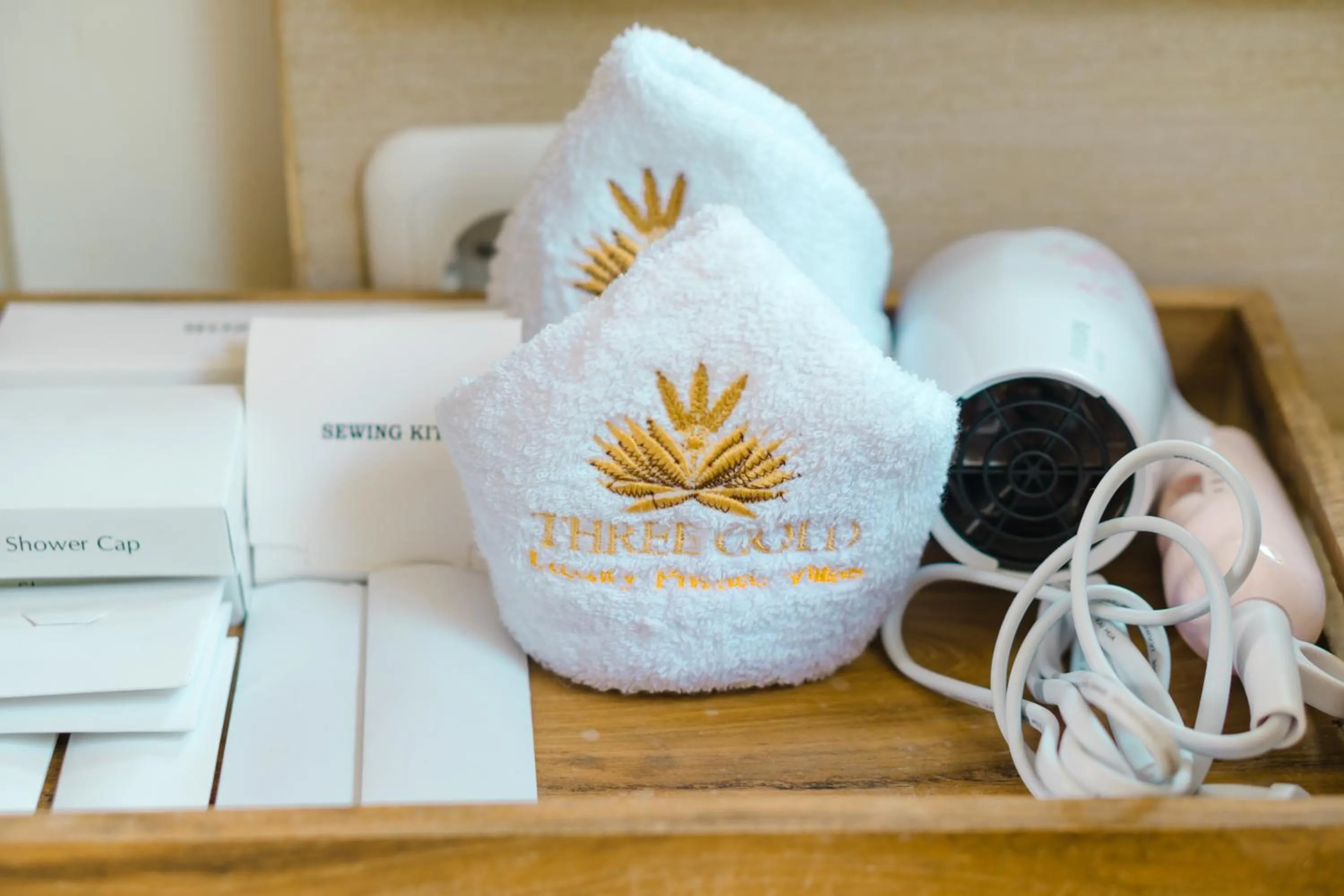 Property logo or sign in Three Gold Luxury Private Villas