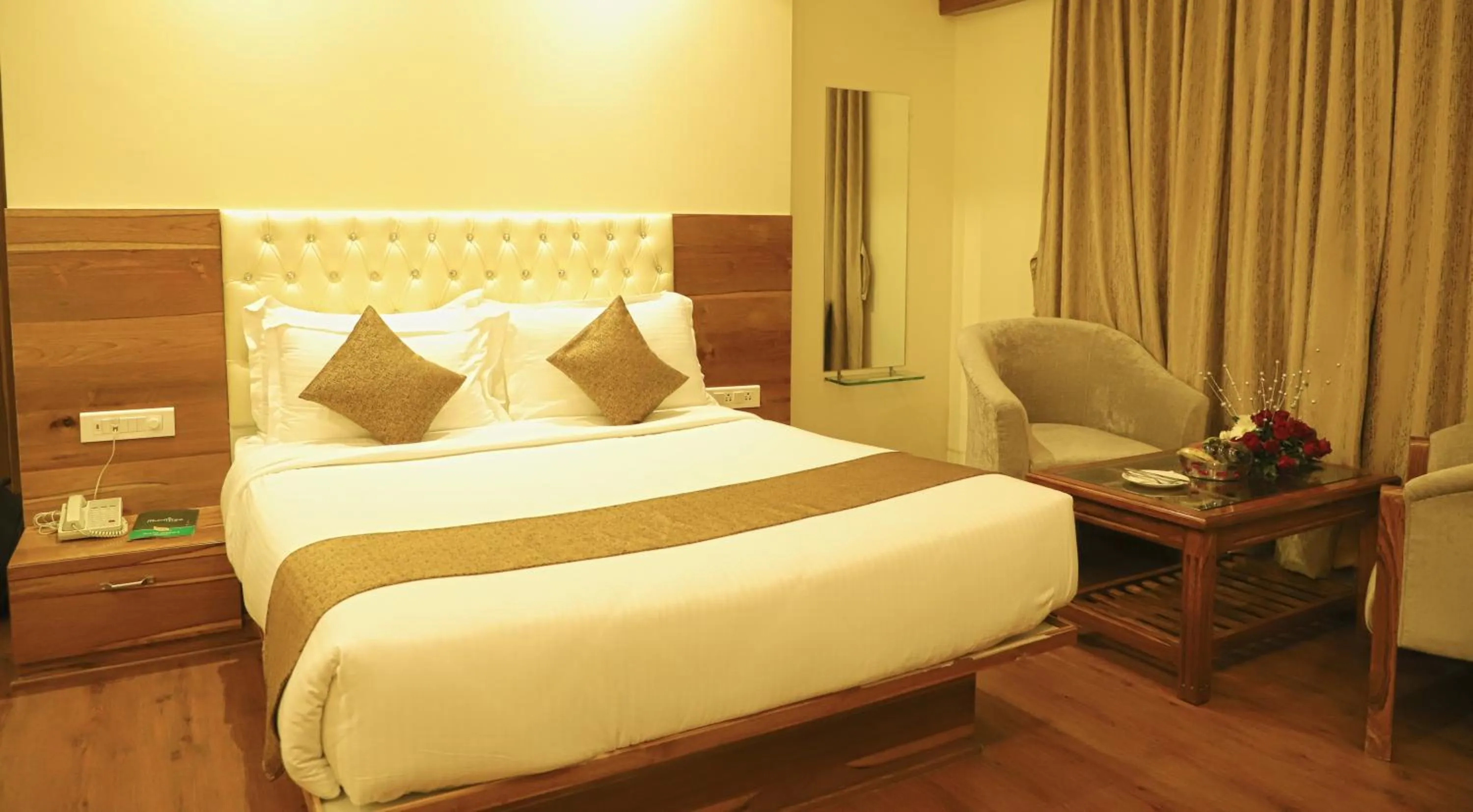 Bed in Sai Neem Tree Hotel