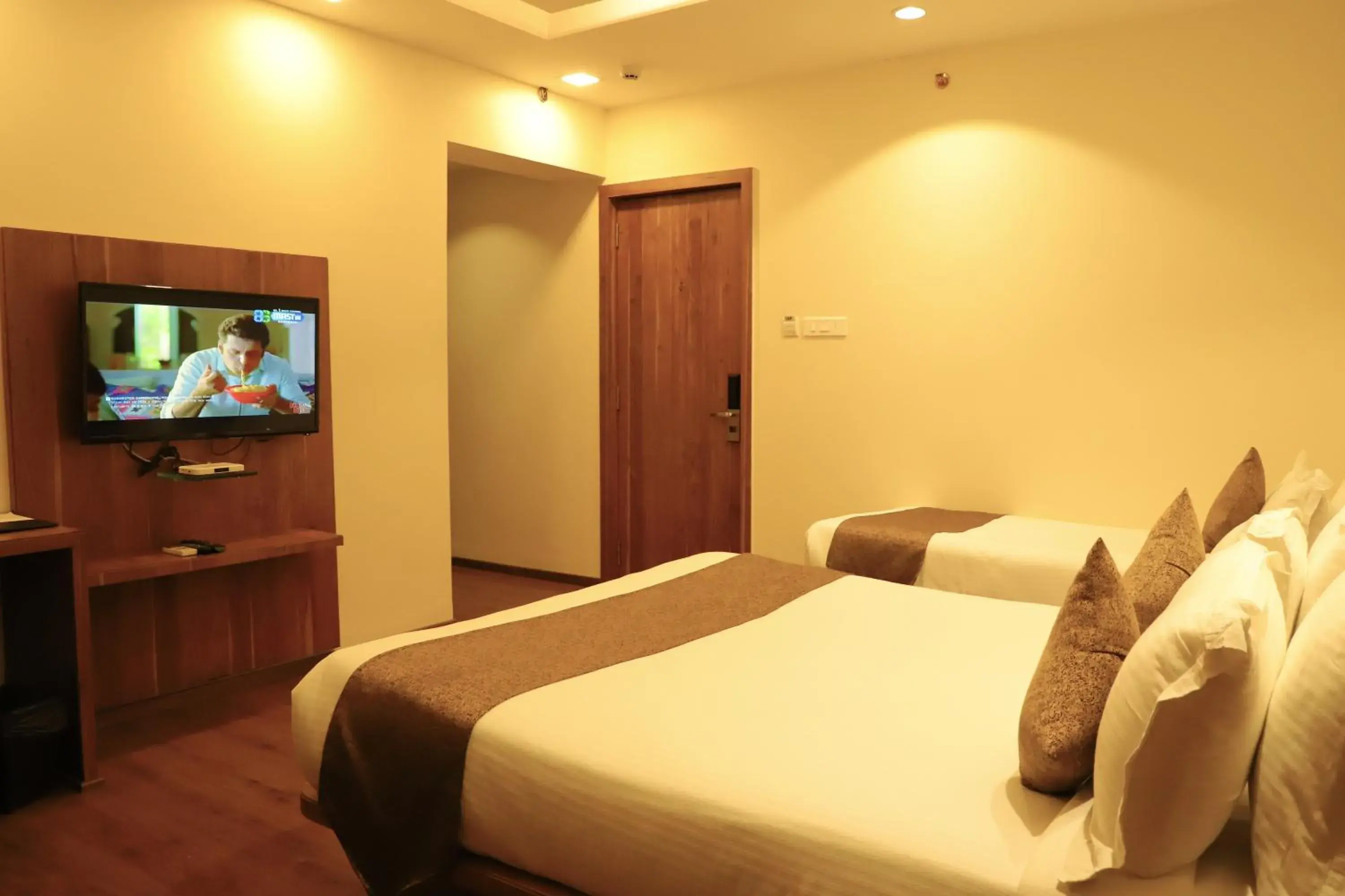 Bed in Sai Neem Tree Hotel Bed in Sai Neem Tree Hotel