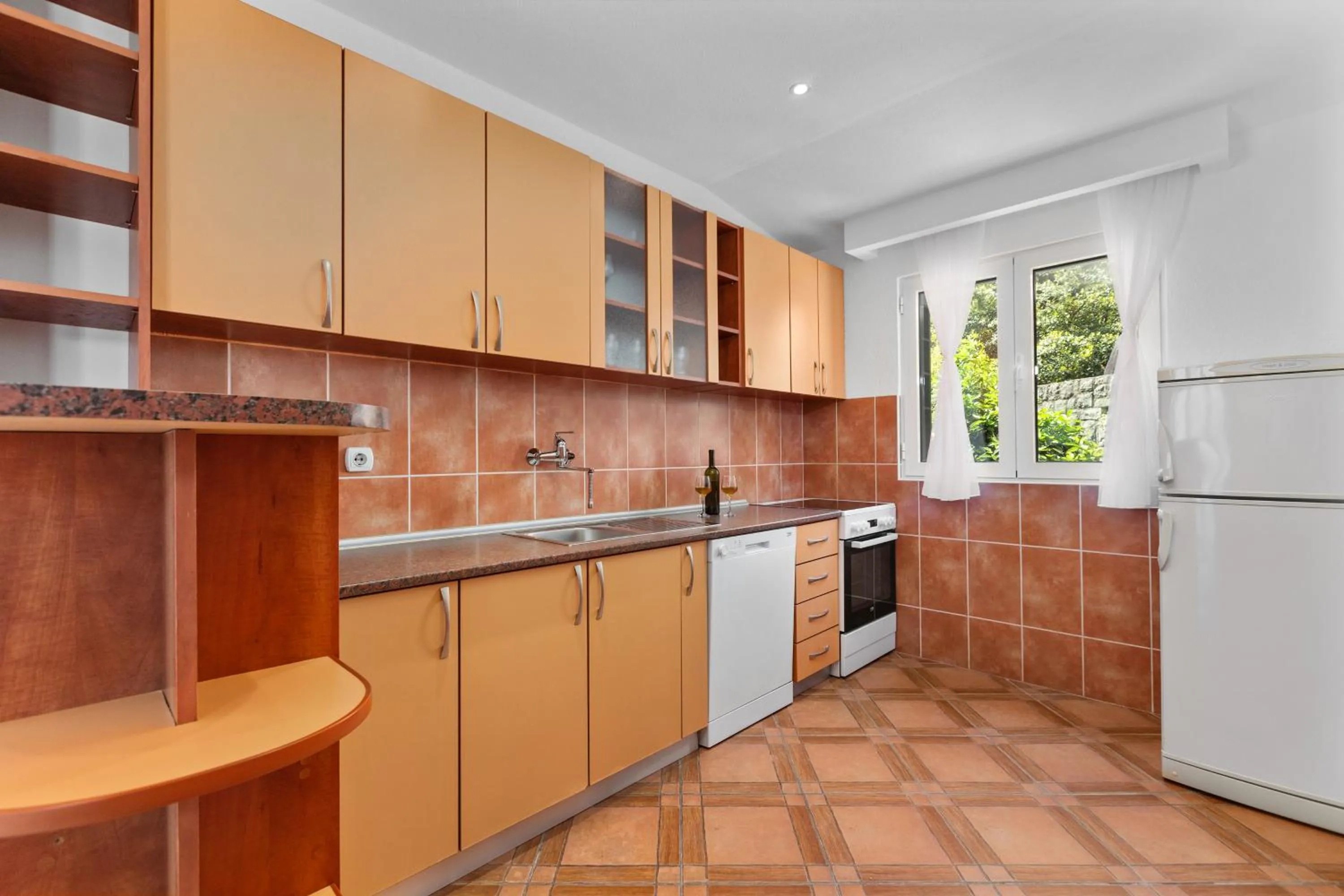 kitchen in Apartments Dončić