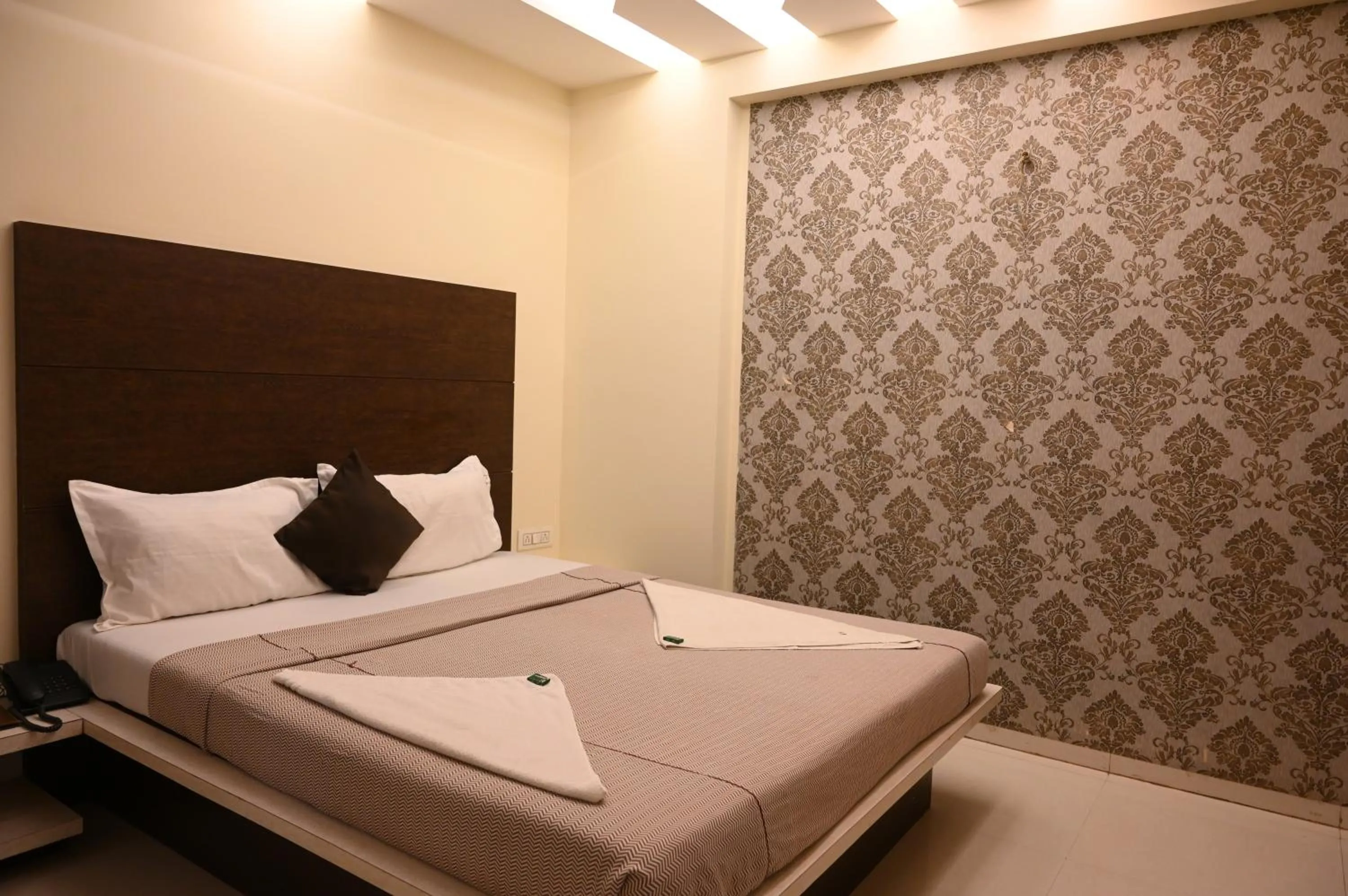 Bed in Hotel Ramkrishna Inn
