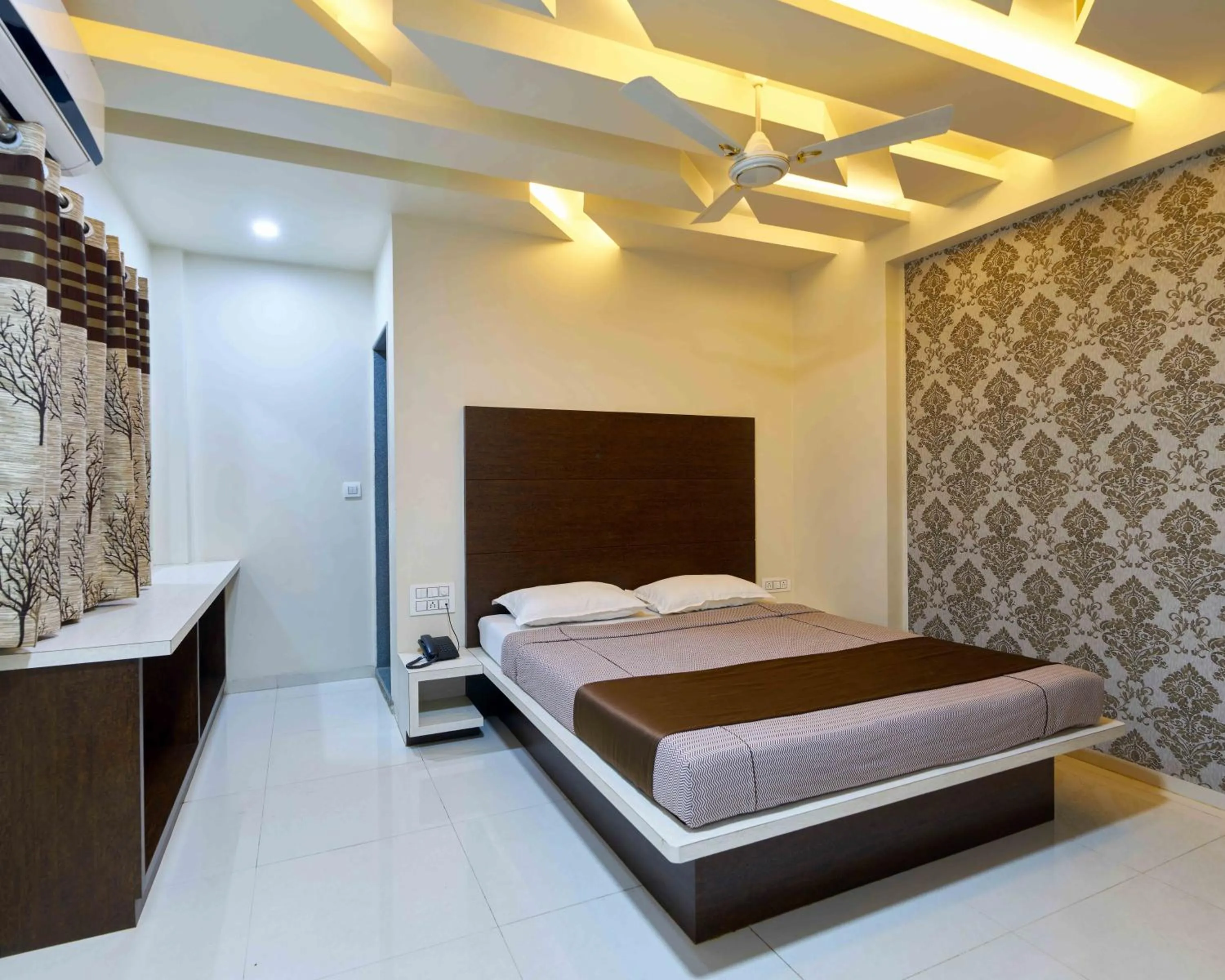 Photo of the whole room, Bed in Hotel Ramkrishna Inn