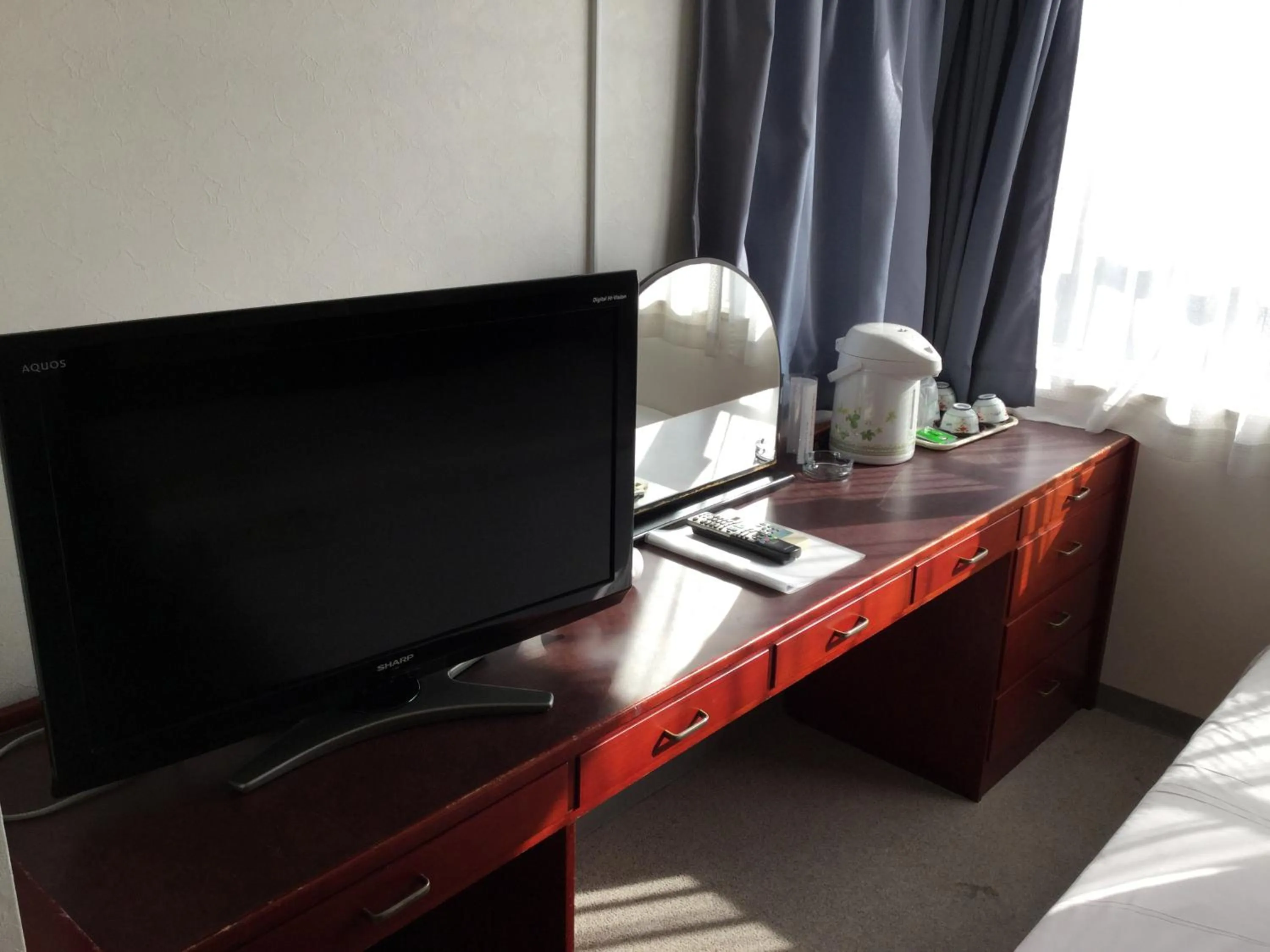 Bed in Hotel Peace Land Ishigaki