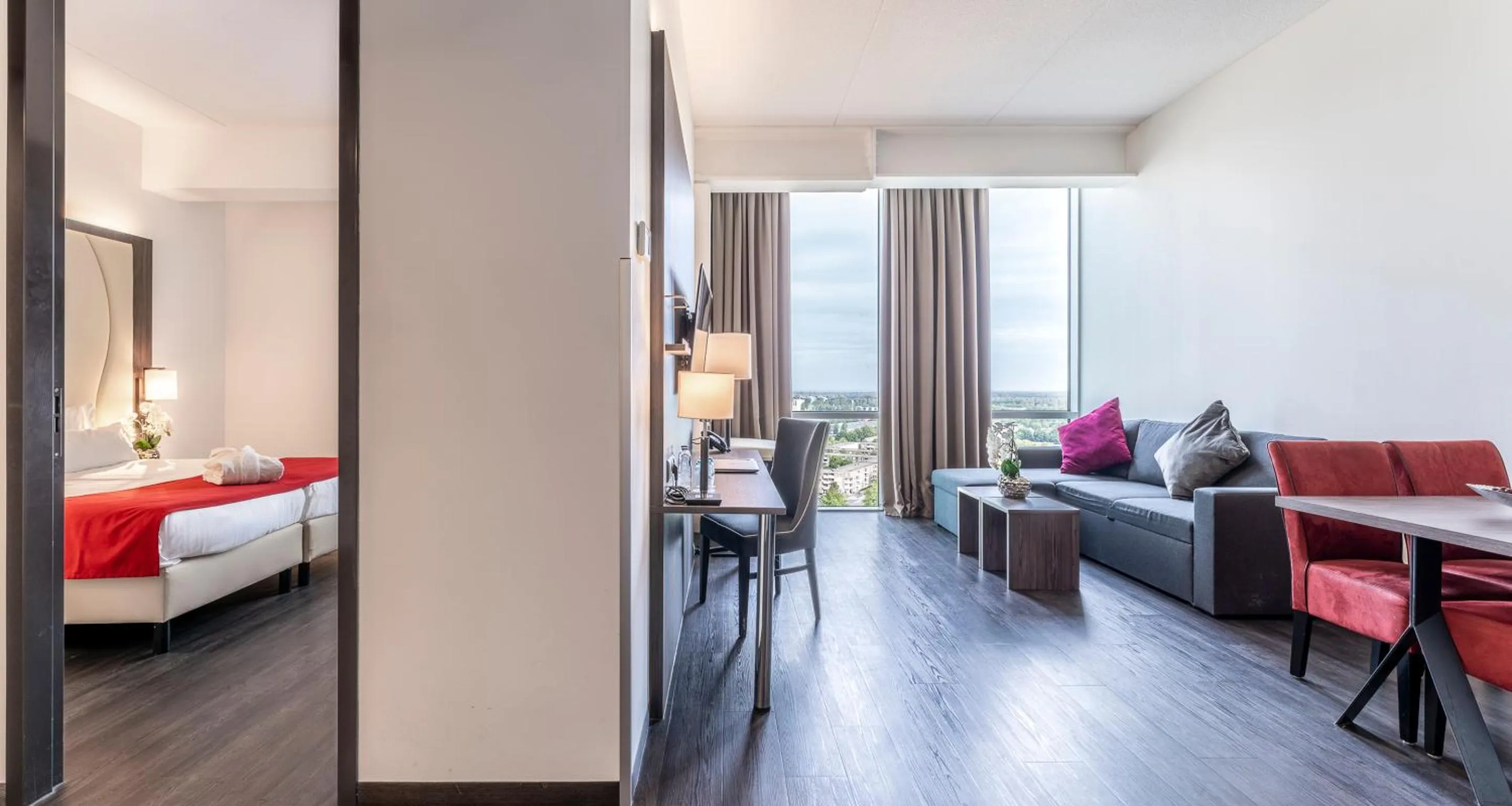 Living room, Bed in PLAZA Premium Almere