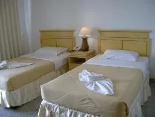 Bed in Maneerote Hotel Bed in Maneerote Hotel