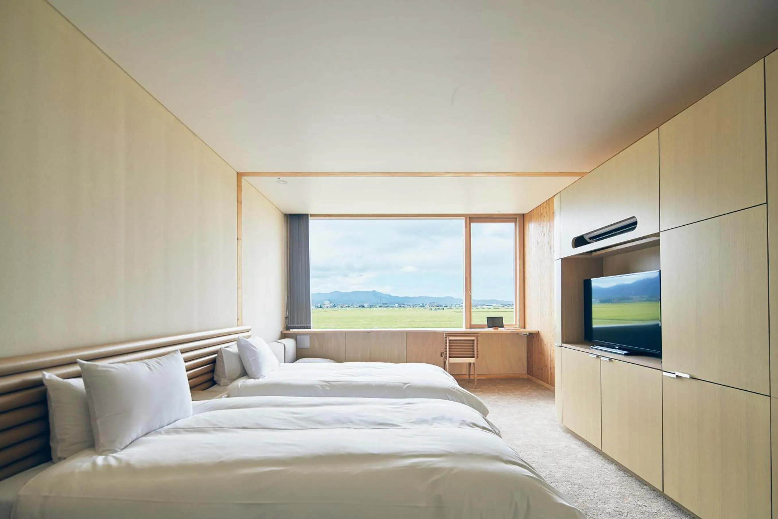 Photo of the whole room, Bed in Shonai Hotel Suiden Terrasse